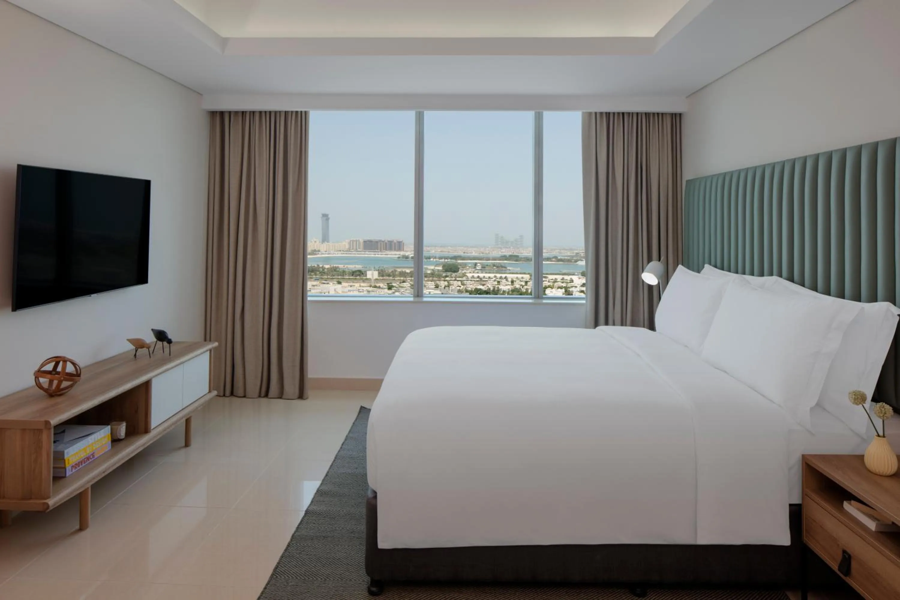 Photo of the whole room, Bed in Staybridge Suites Dubai Internet City by IHG