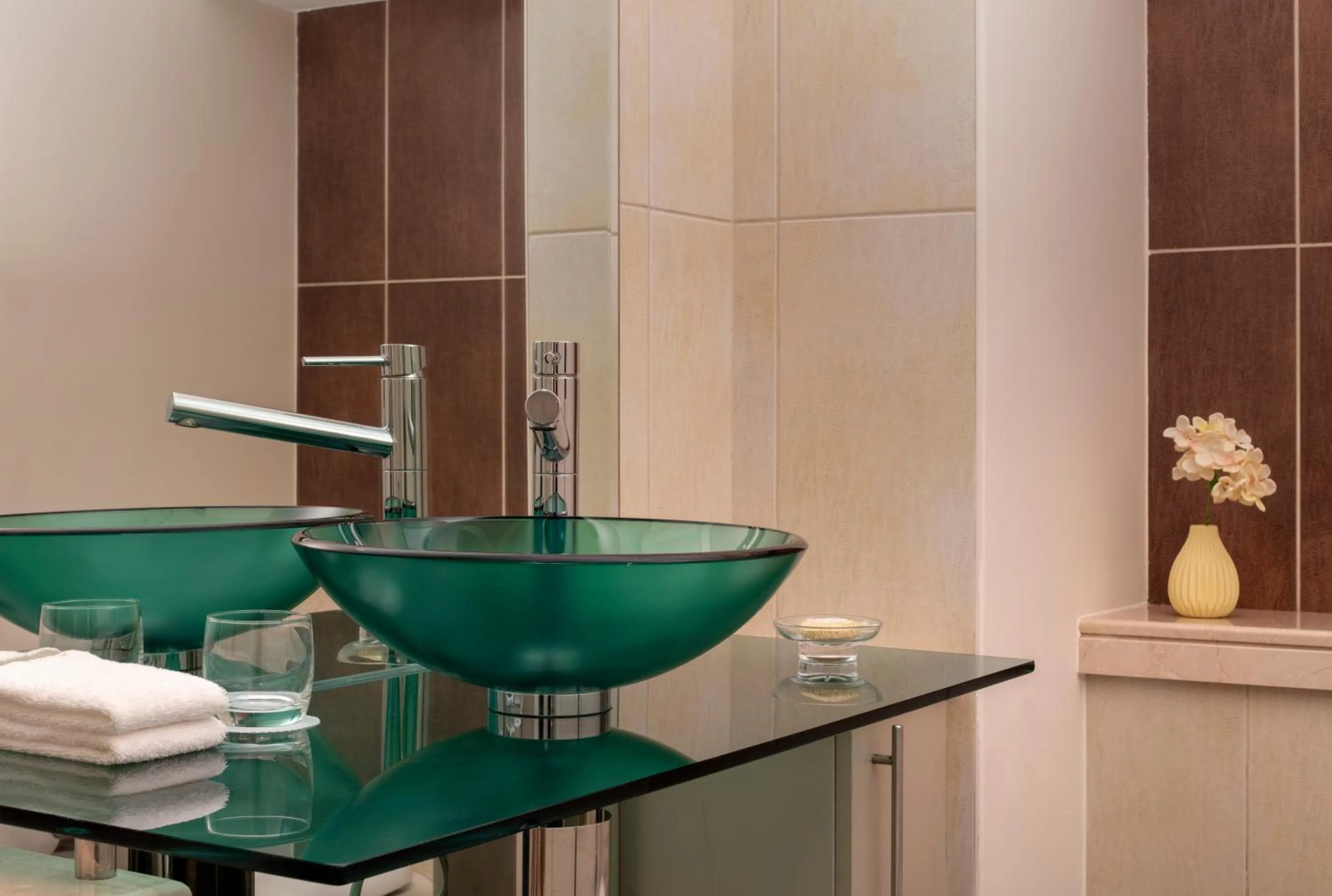 Bathroom in Staybridge Suites Dubai Internet City by IHG