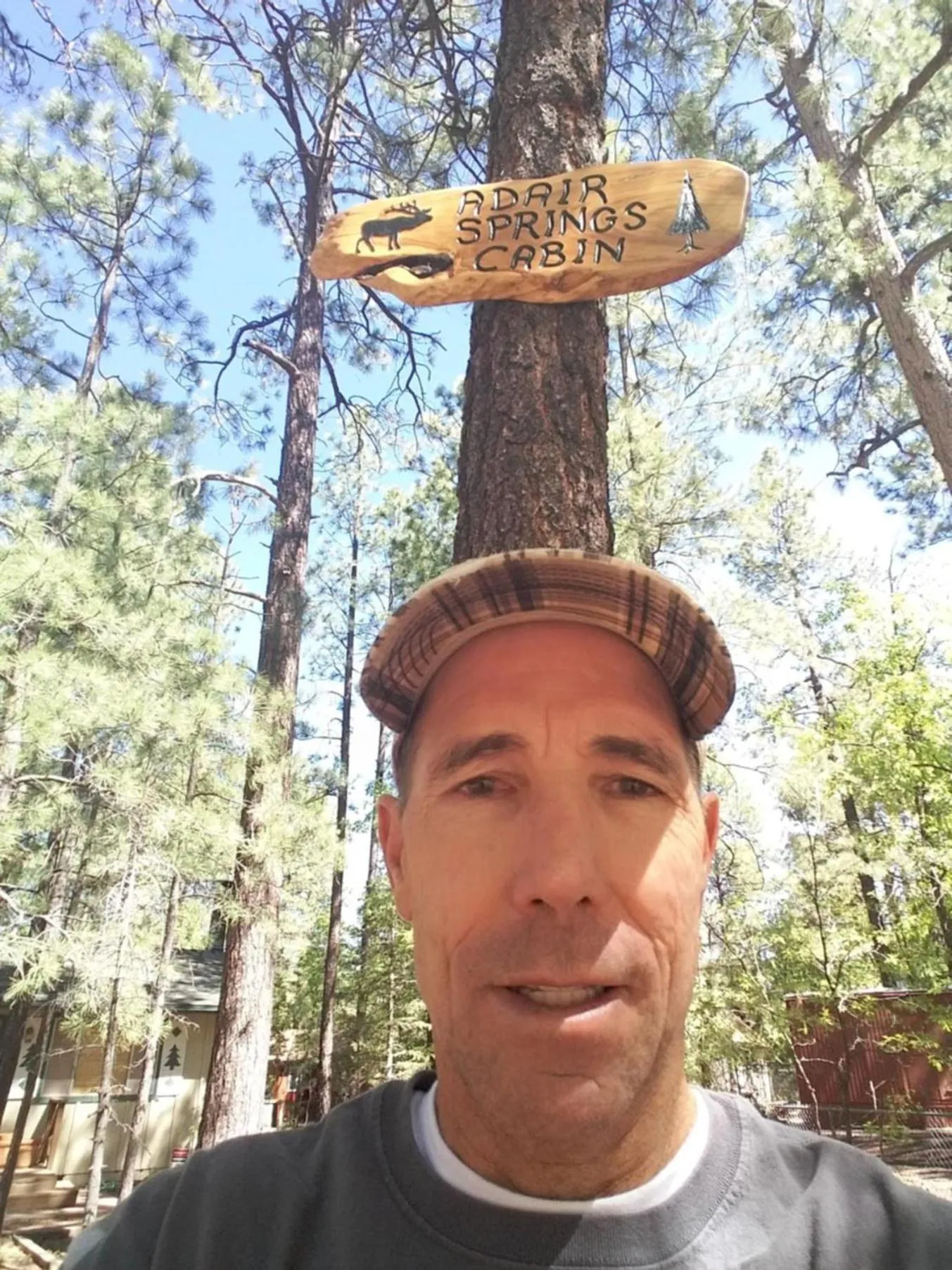 Property logo or sign in Adair Springs Cabin