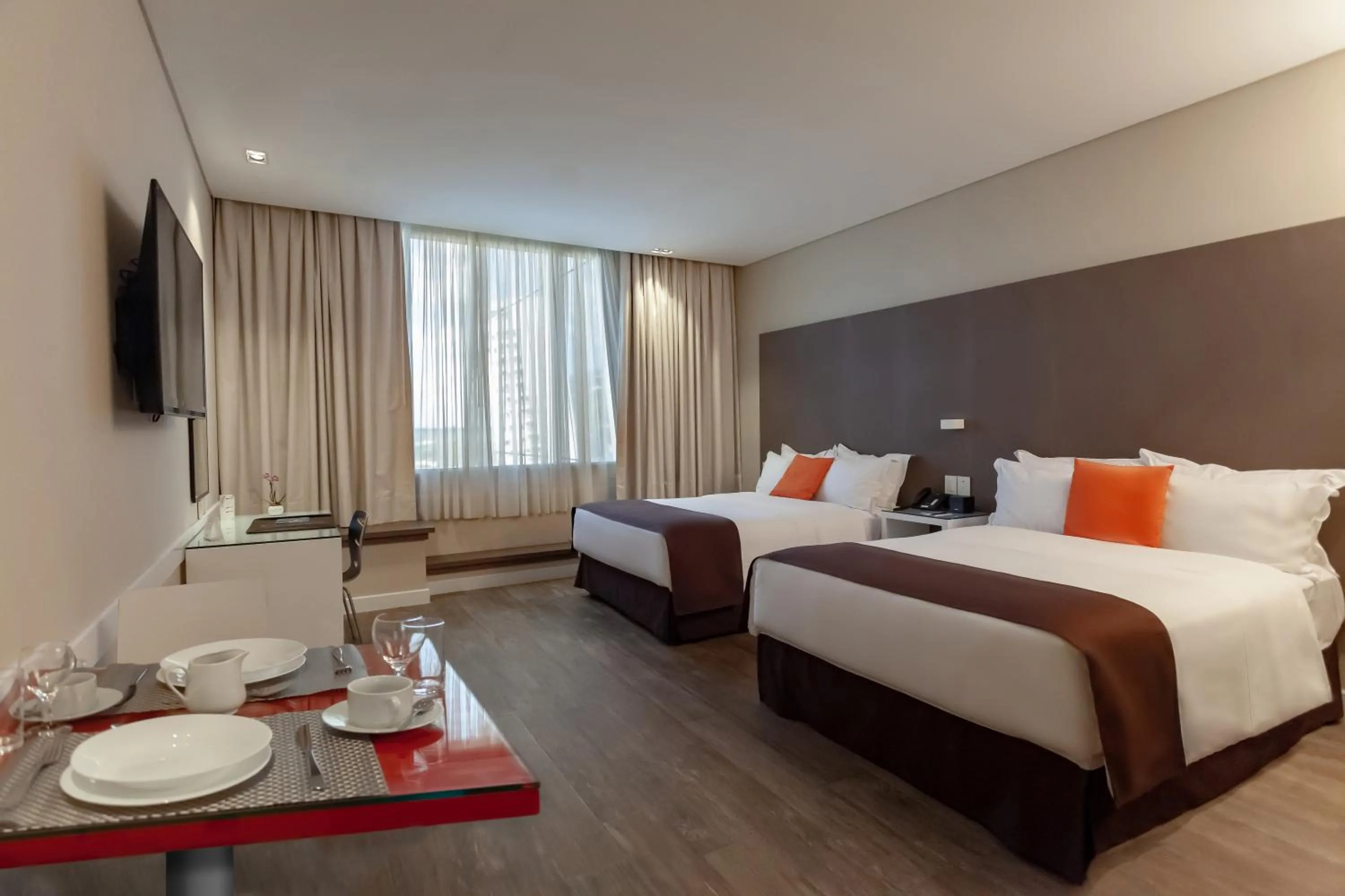 Bed in Paseo La Galería Hotel & Suites