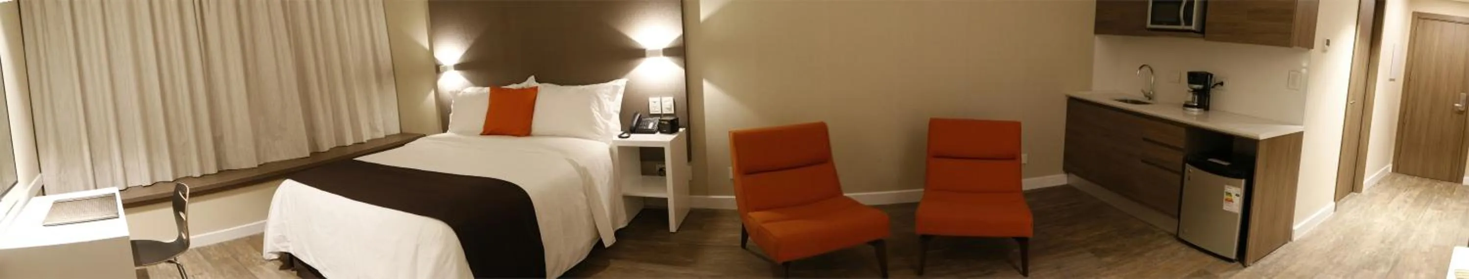 Bed in Paseo La Galería Hotel & Suites