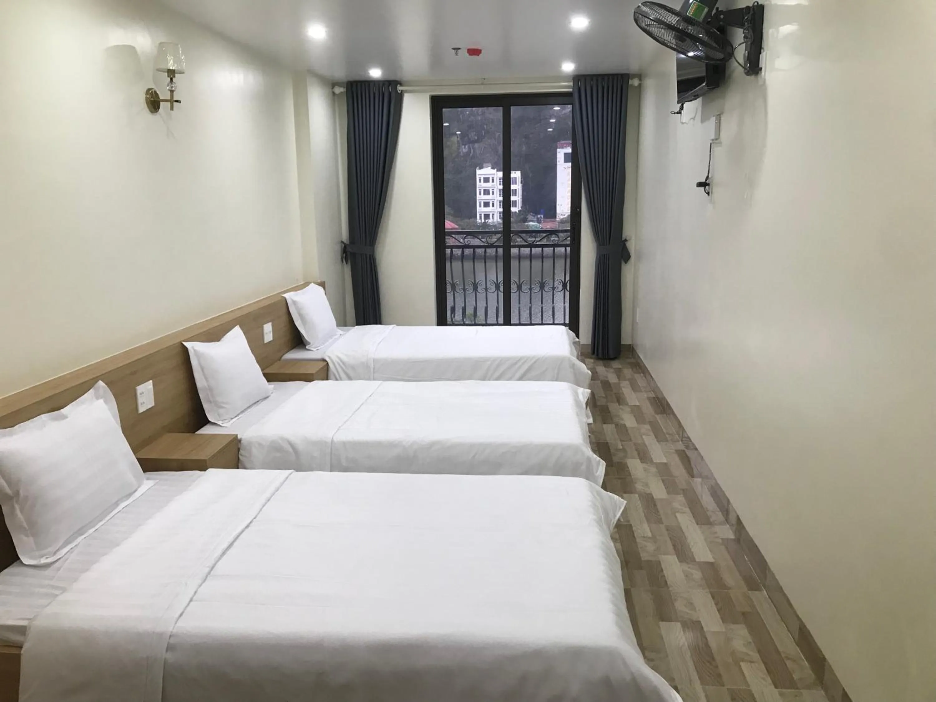 Bed in Sea Balcony Hotel