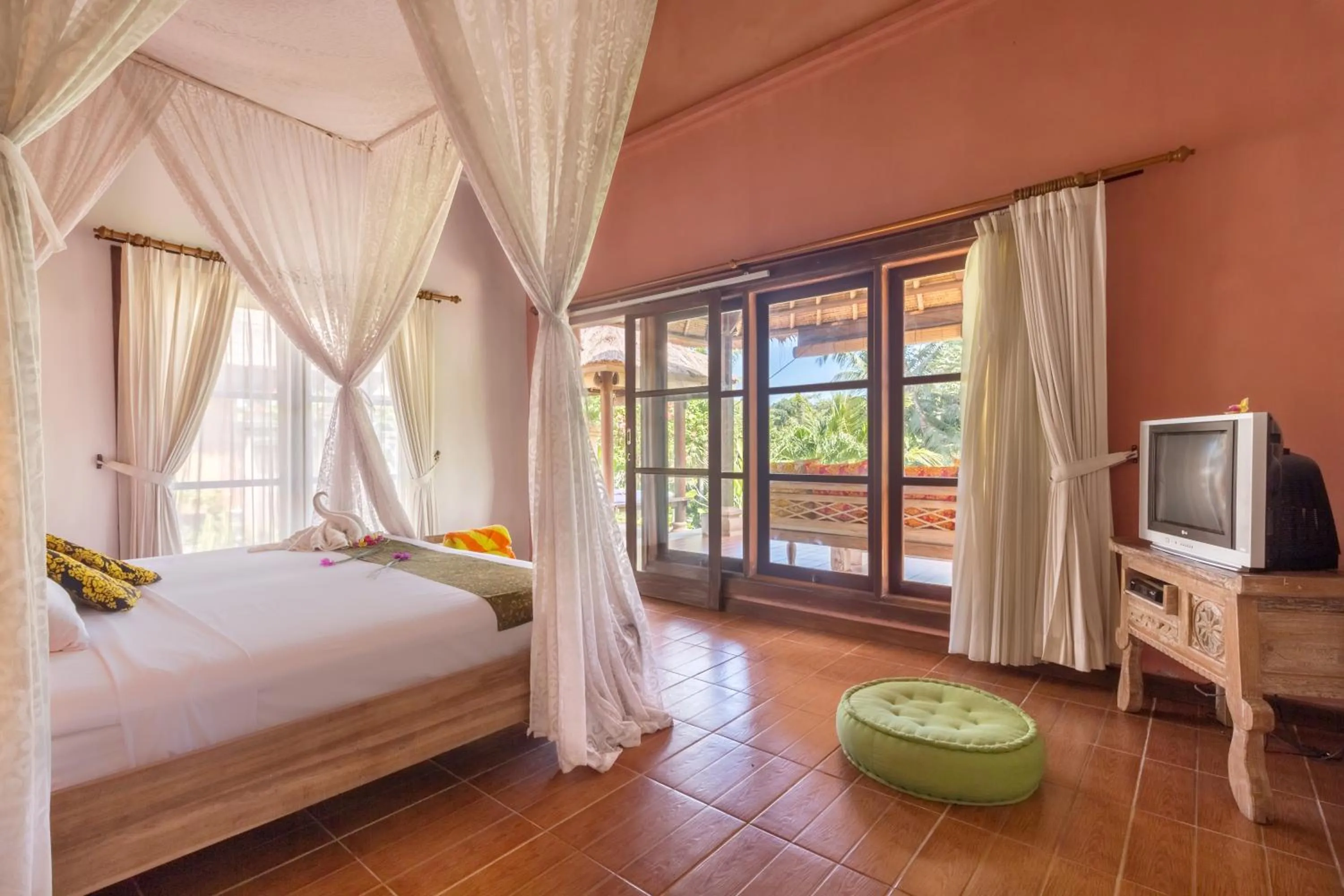 Bed in Puri Taman Sari Resort