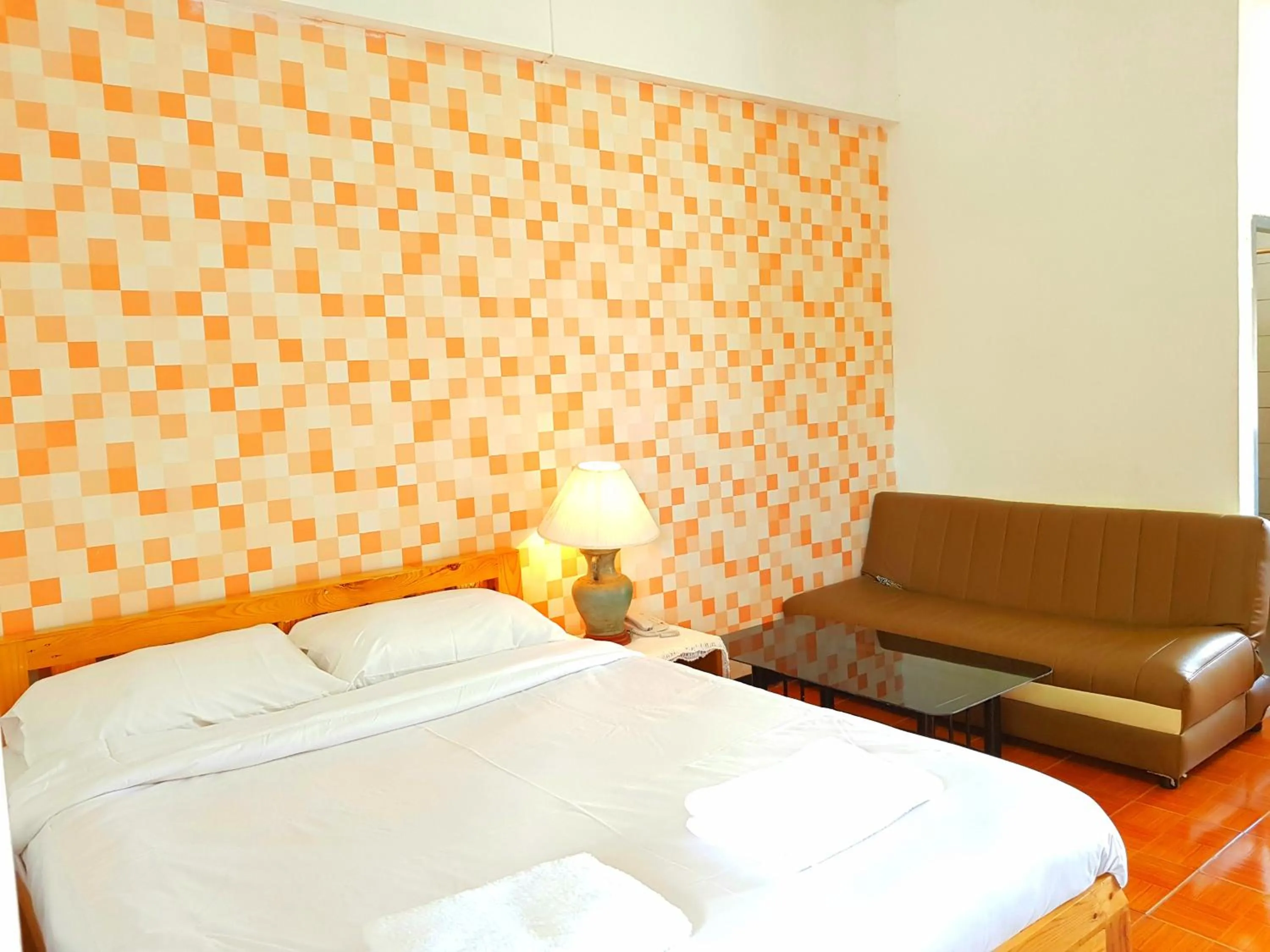 Bed in Wiang Inn Mansion