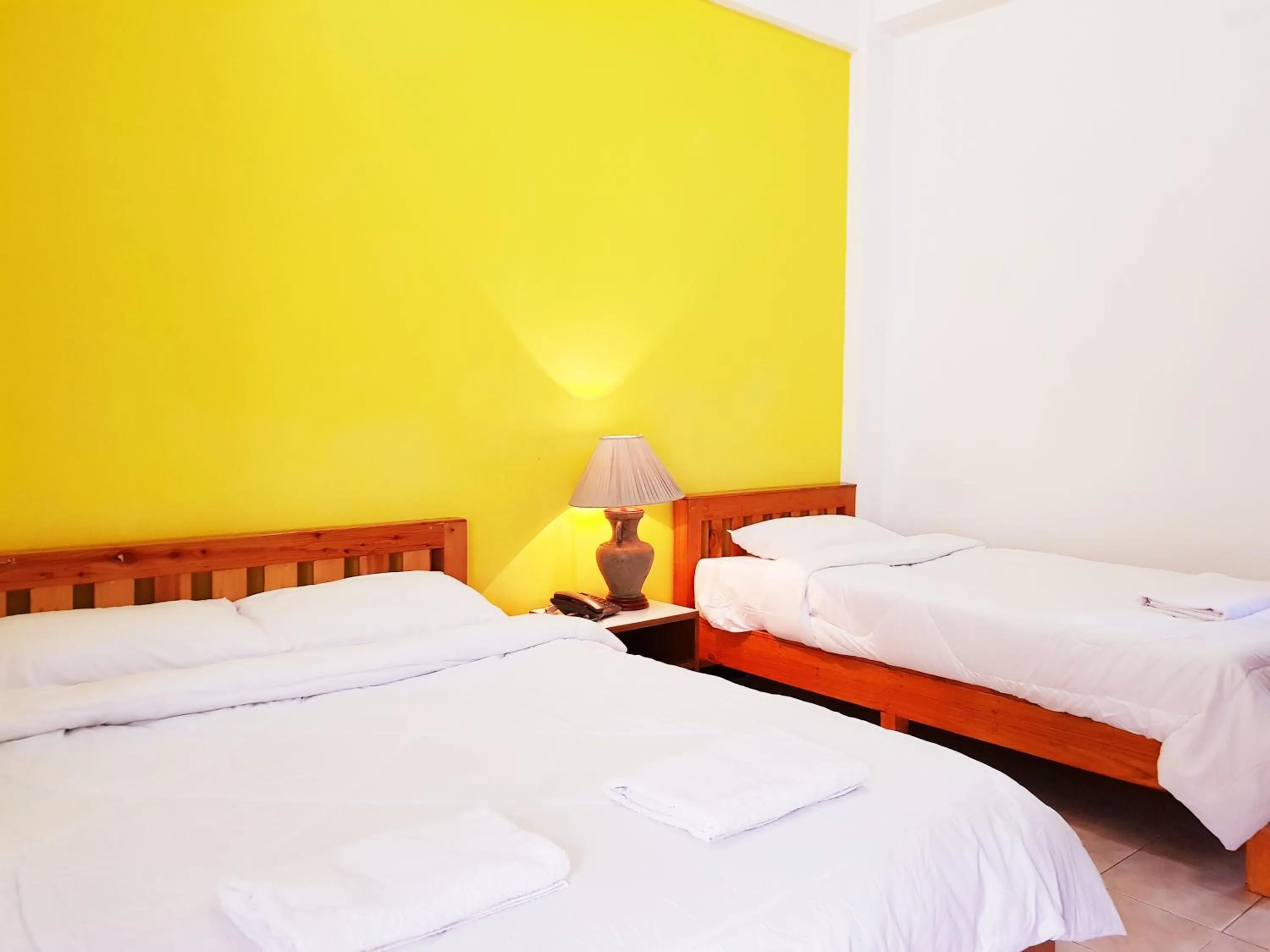 Bed in Wiang Inn Mansion