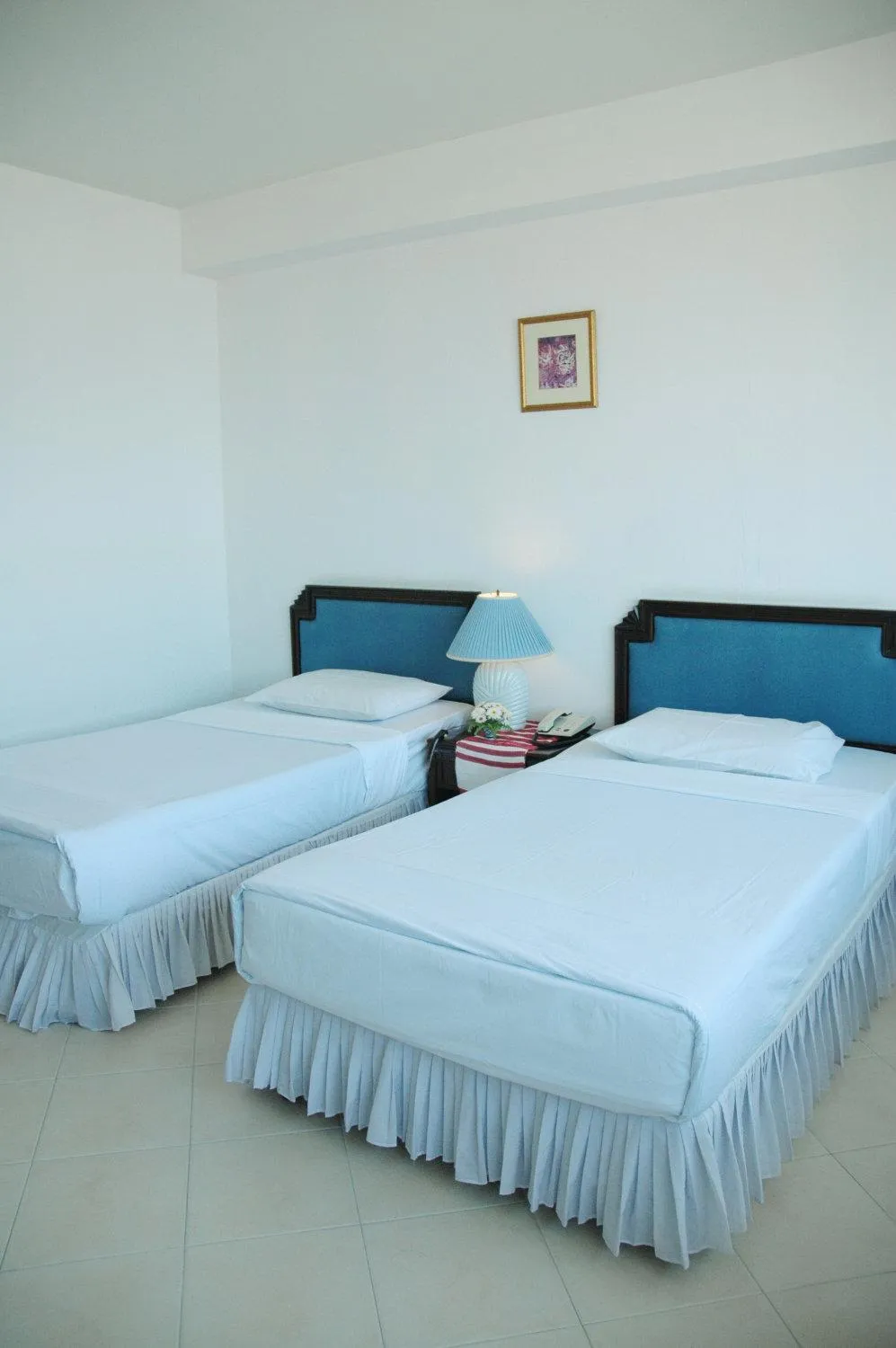 Bed in The International Hotel Chiang Mai - YMCA