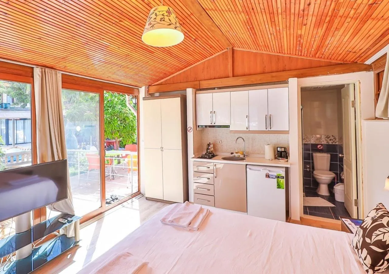 Kitchen or kitchenette, Bed in Villa Dundar - Kas Apart Otel