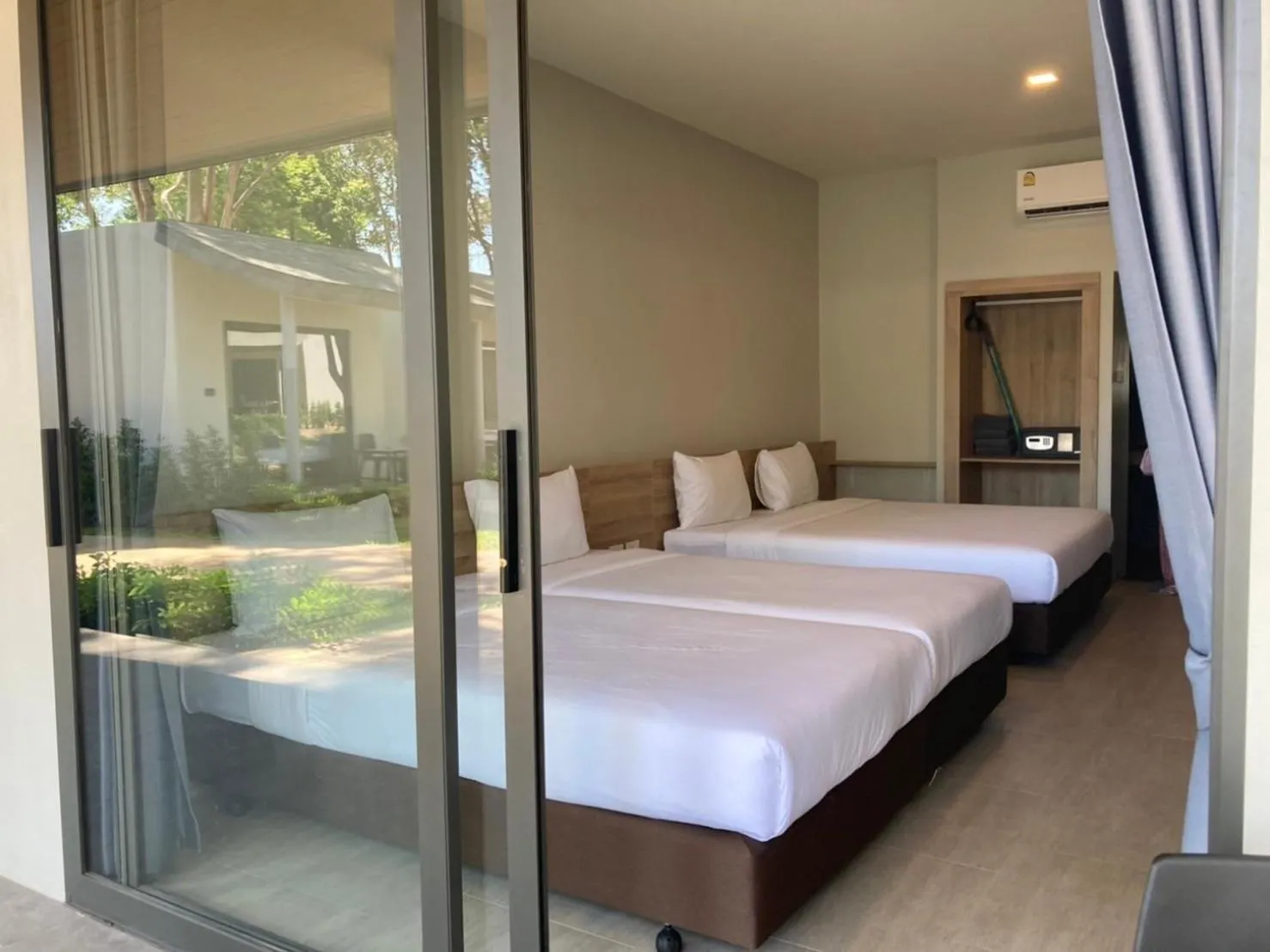 Bed in Rayong Chalet Resort