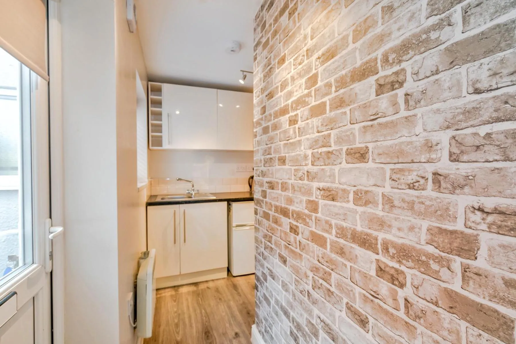 Kitchen or kitchenette in Cannock Hotel Apartments