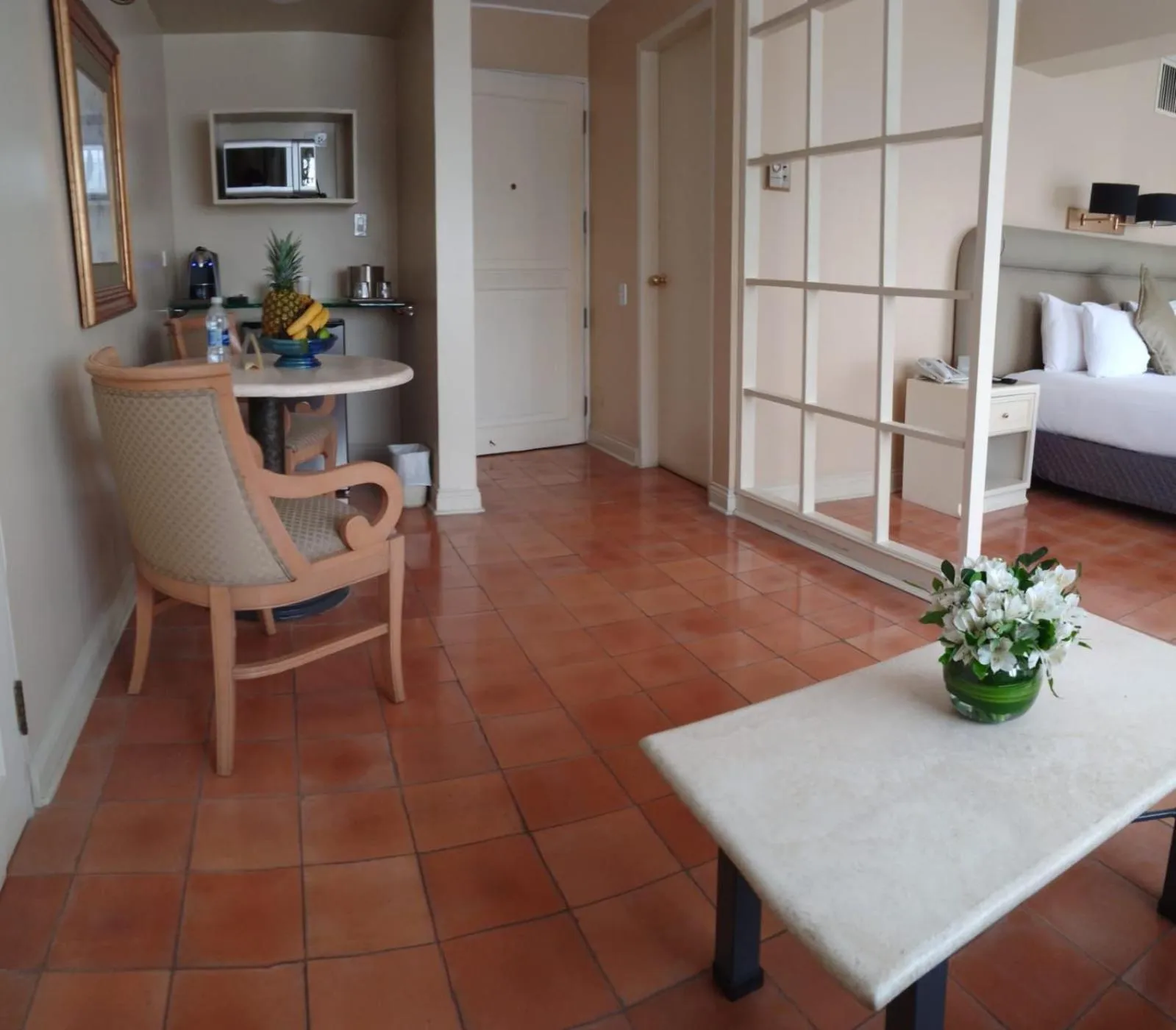 Seating area, Bed in Suites del Bosque Hotel