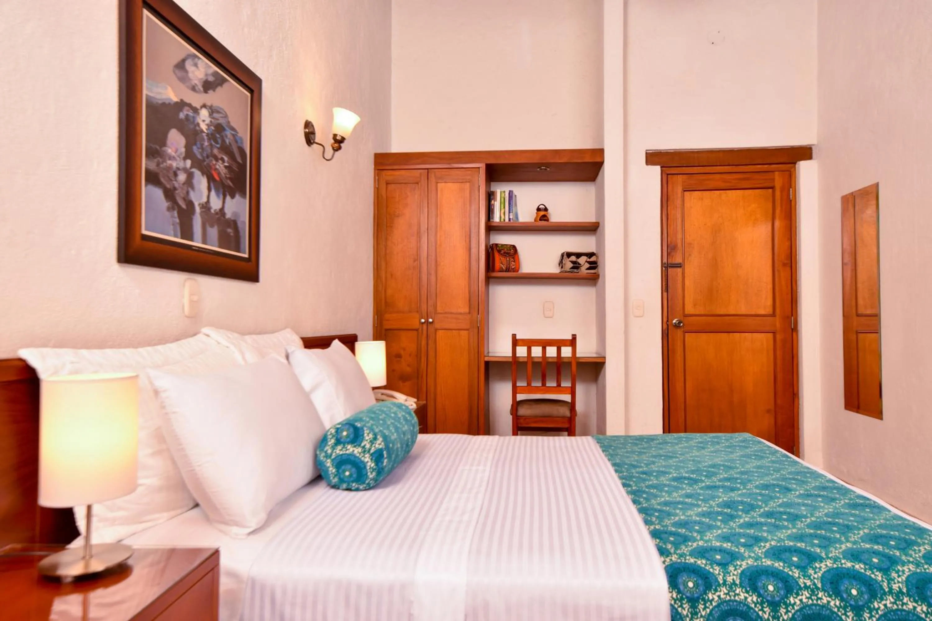 Bed in La Campana Hotel Boutique