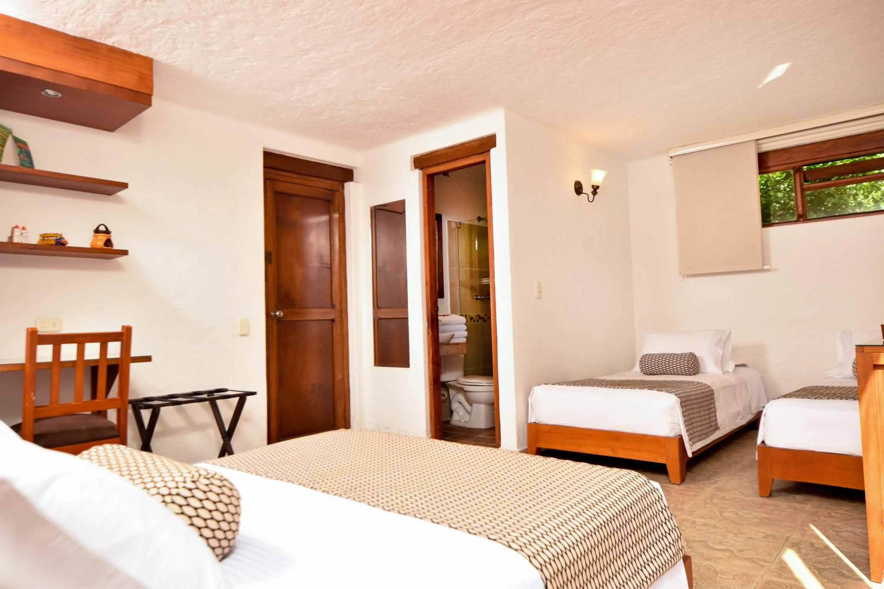 Bed in La Campana Hotel Boutique