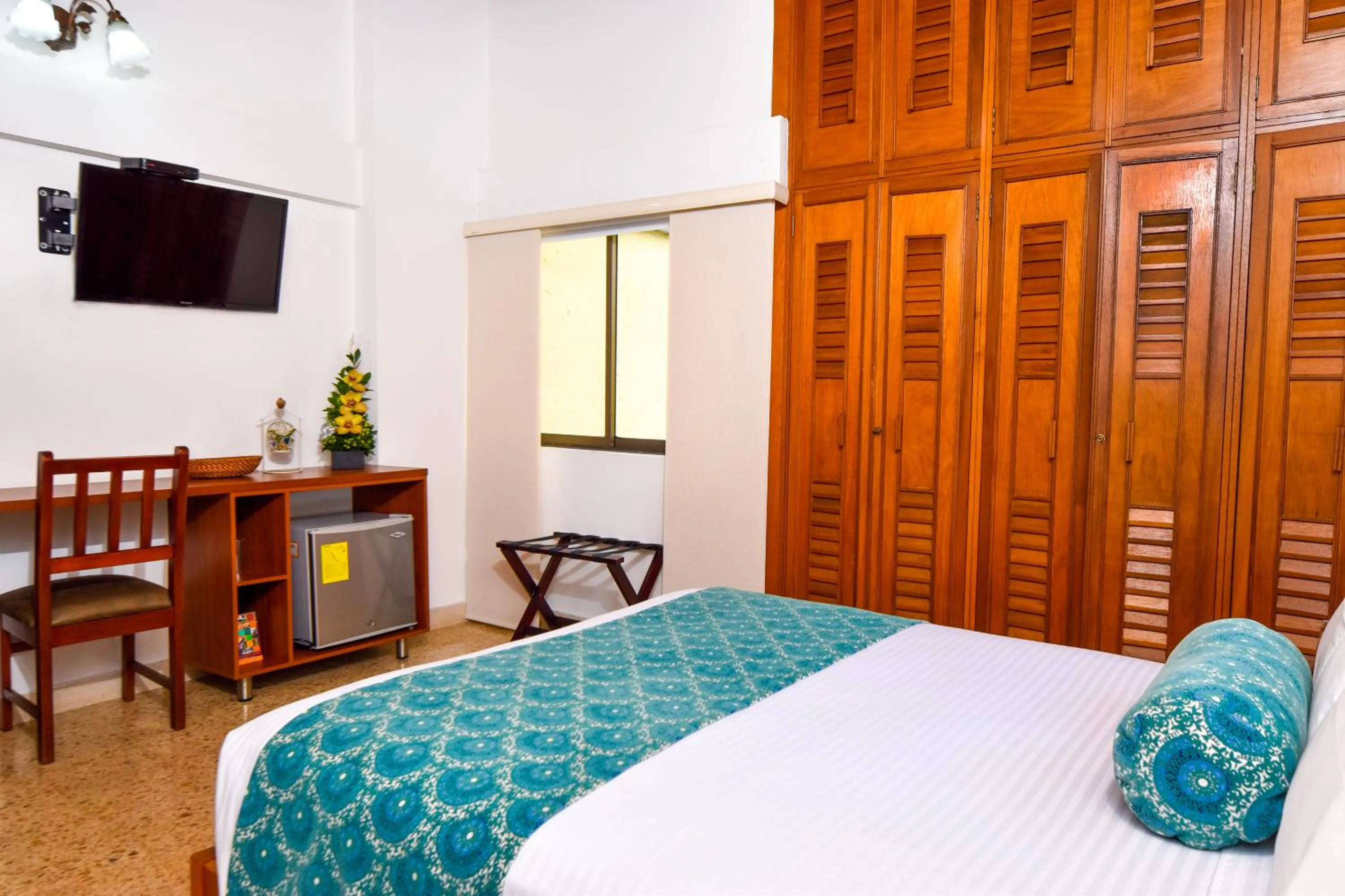 Bed in La Campana Hotel Boutique