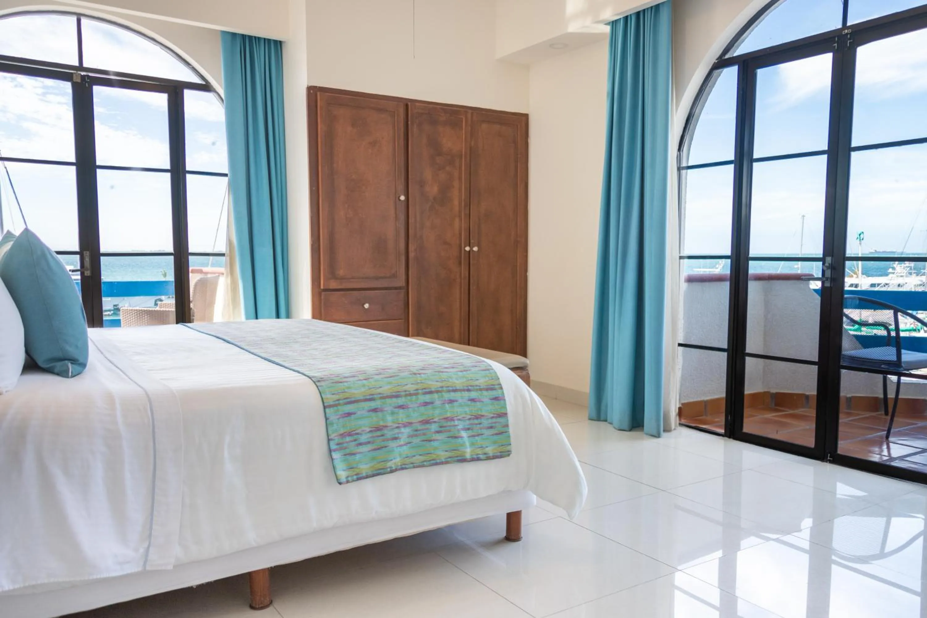 Bed in The Westmarine Waterfront Hotel