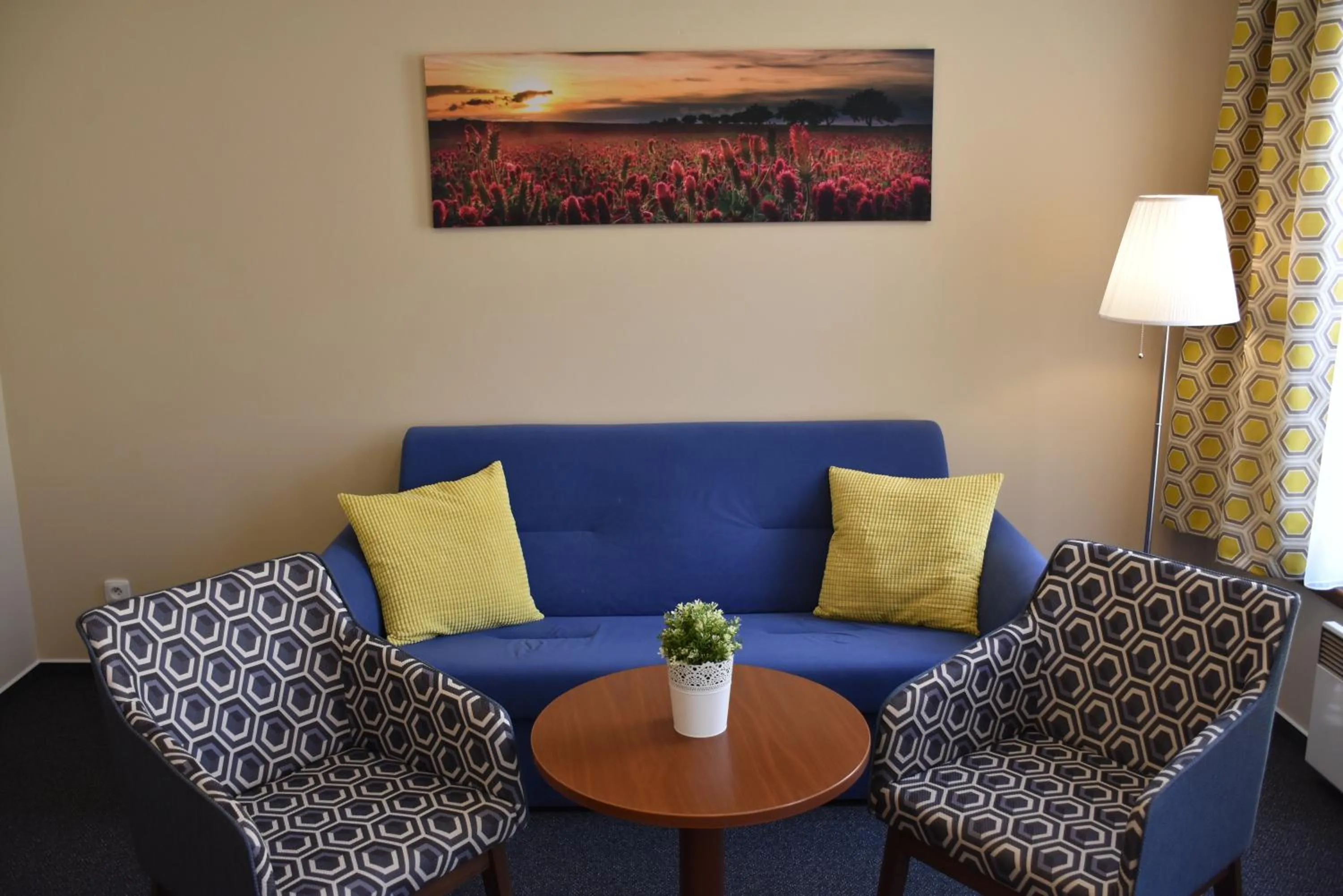 Seating area in Aparthotel Austria Suites