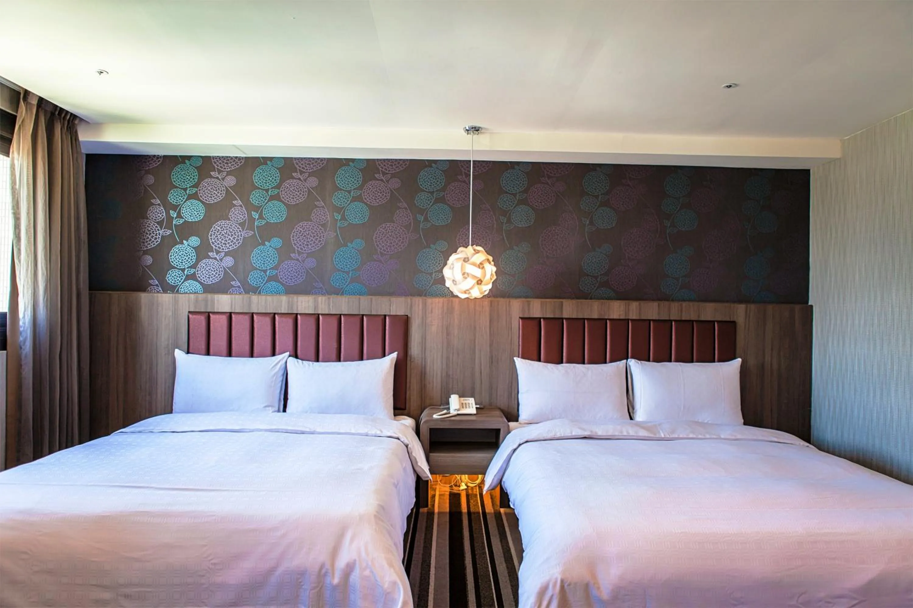 Bed in JUNG-ZAW BUSSINESS HOTEL