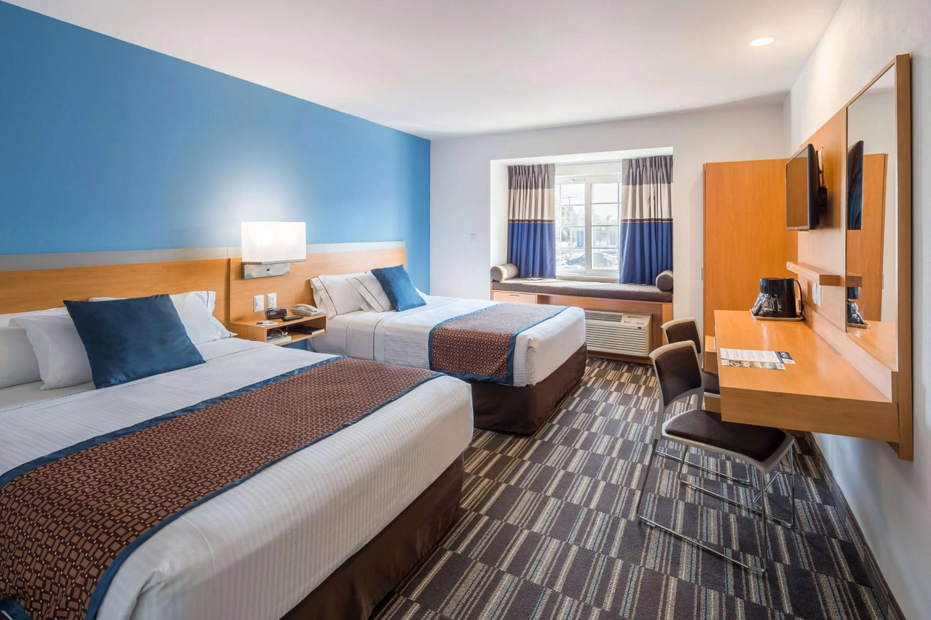 Photo of the whole room, Bed in Microtel Inn & Suites by Wyndham Culiacán