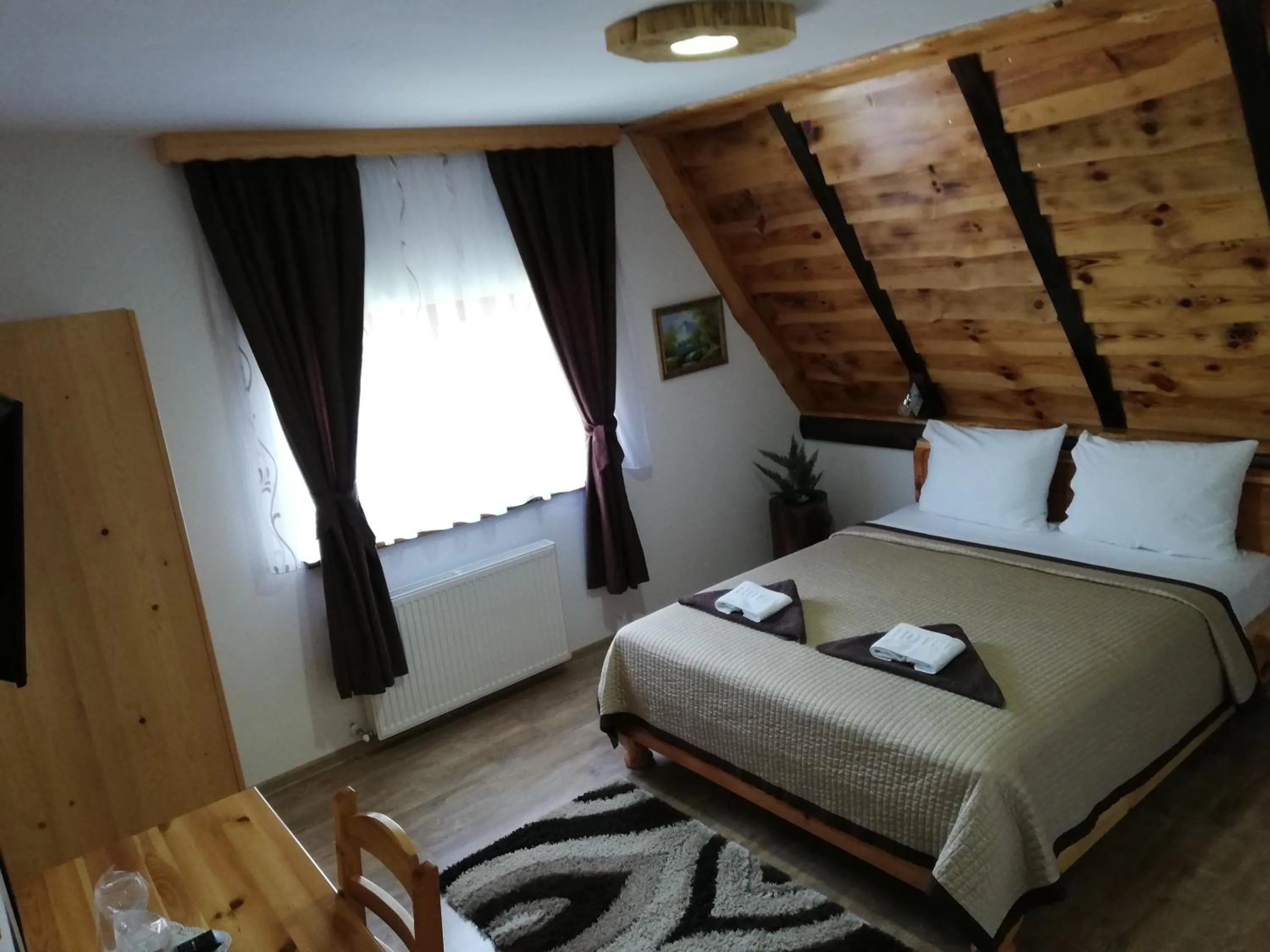 Bed in Rustic Lodge Plitvice