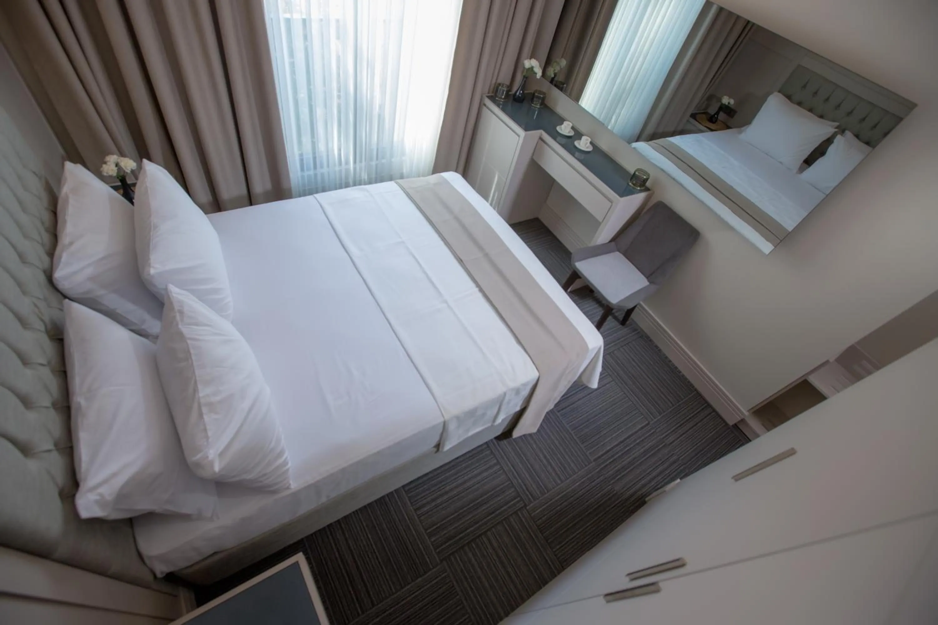 Communal lounge/ TV room, Bed in Anatolia Inn