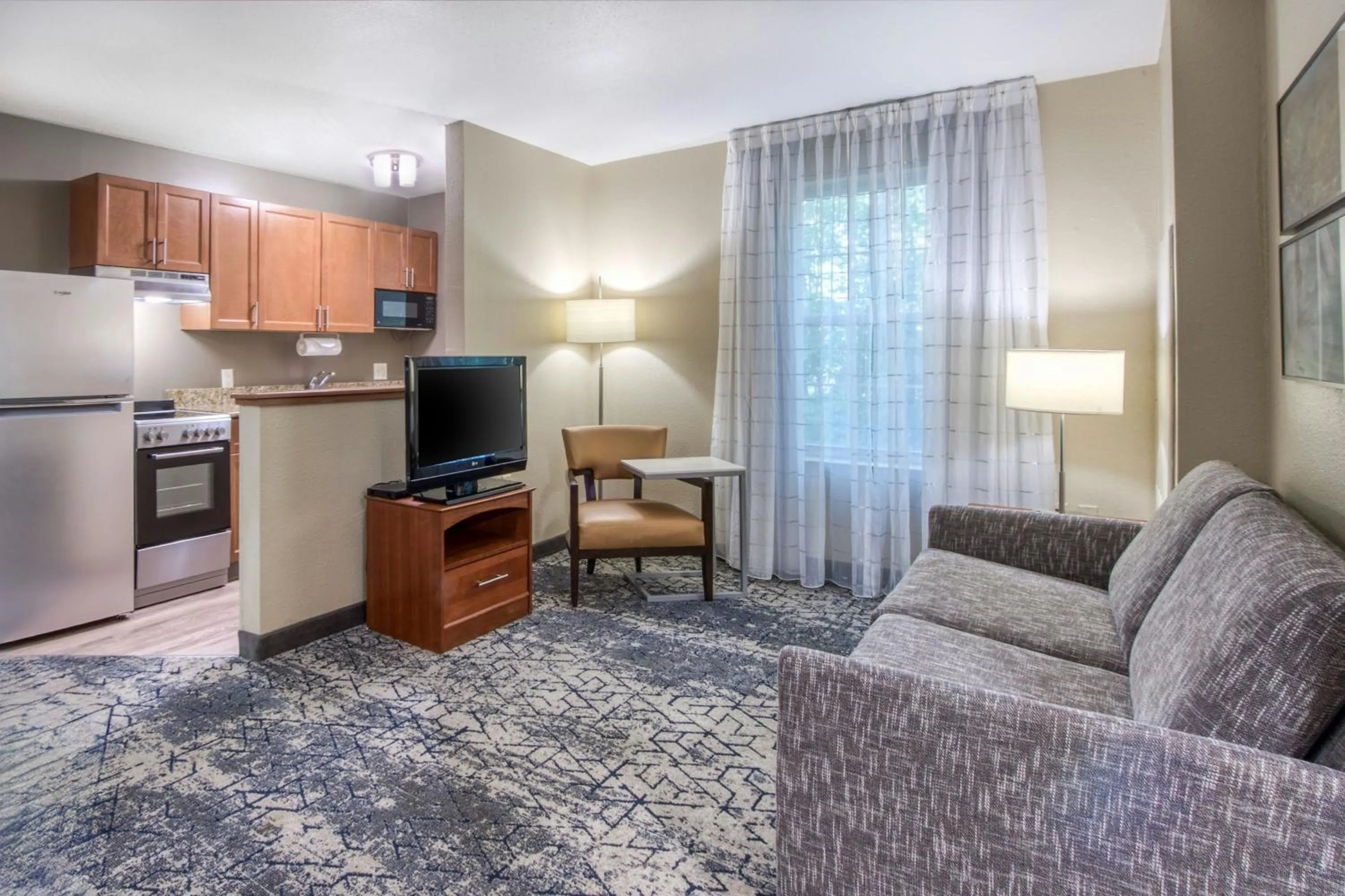 Living room in TownePlace Suites Raleigh Cary/Weston Parkway