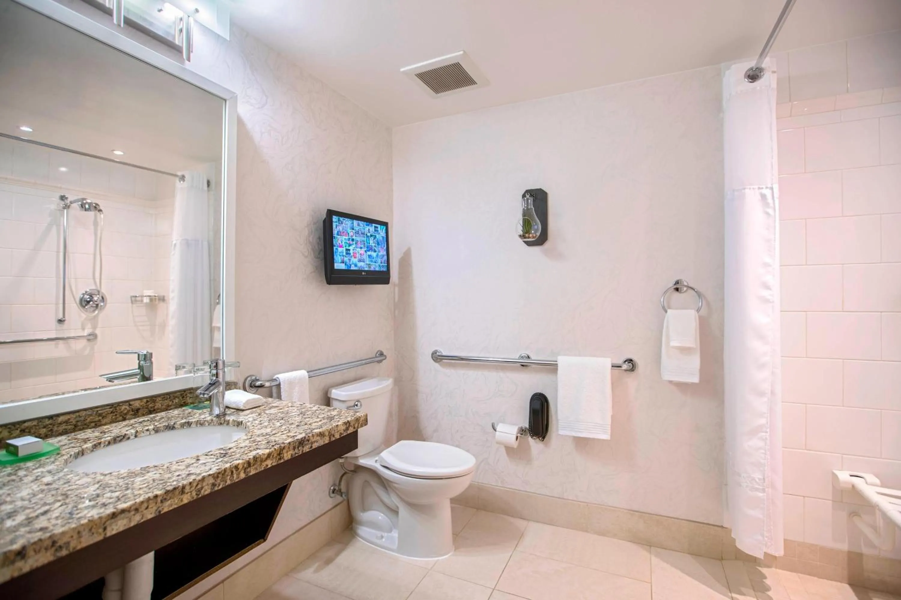 Bathroom in Renaissance Raleigh North Hills Hotel