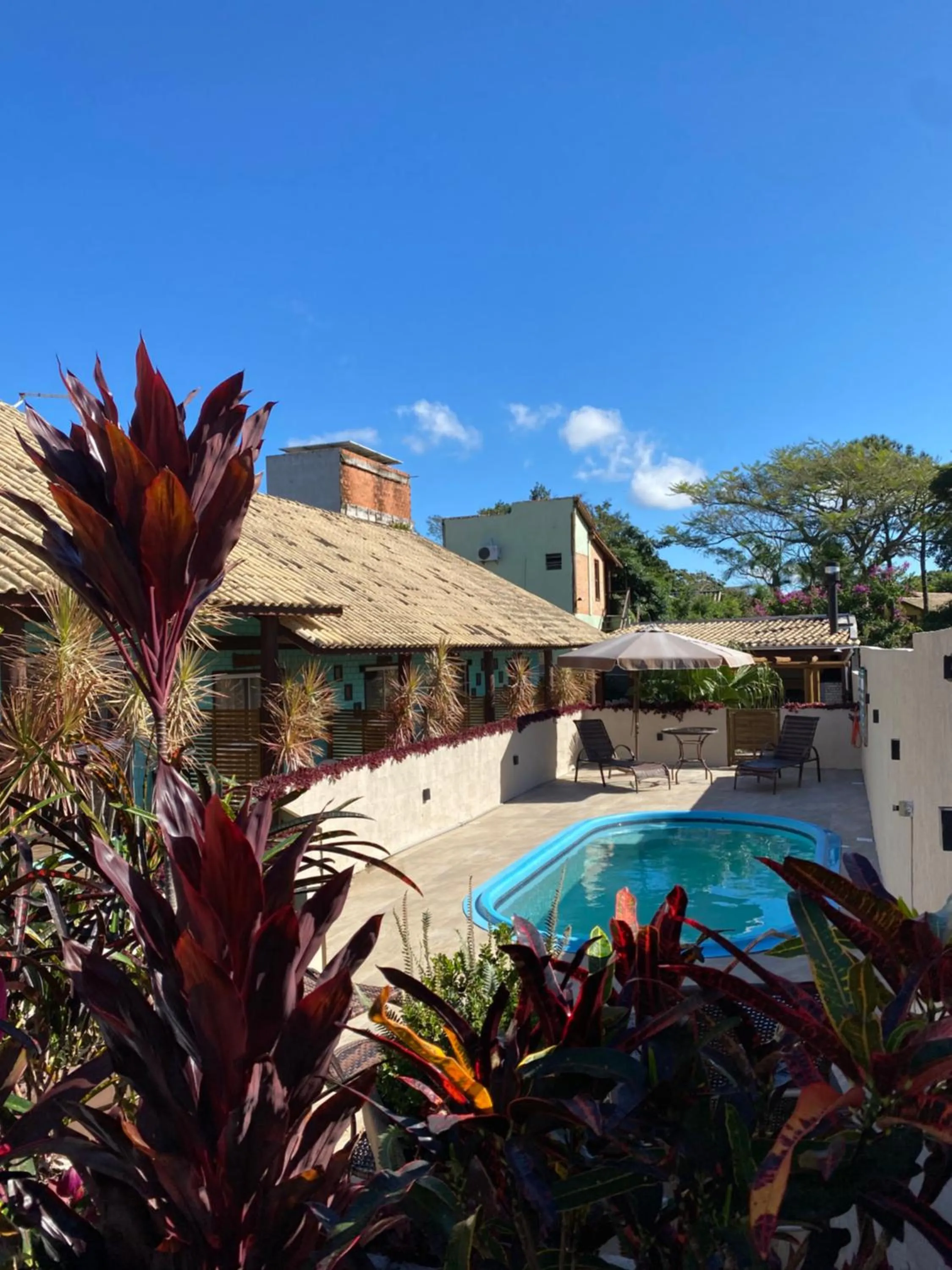 Swimming pool in Pousada Hanalie by - Easy Hotéis