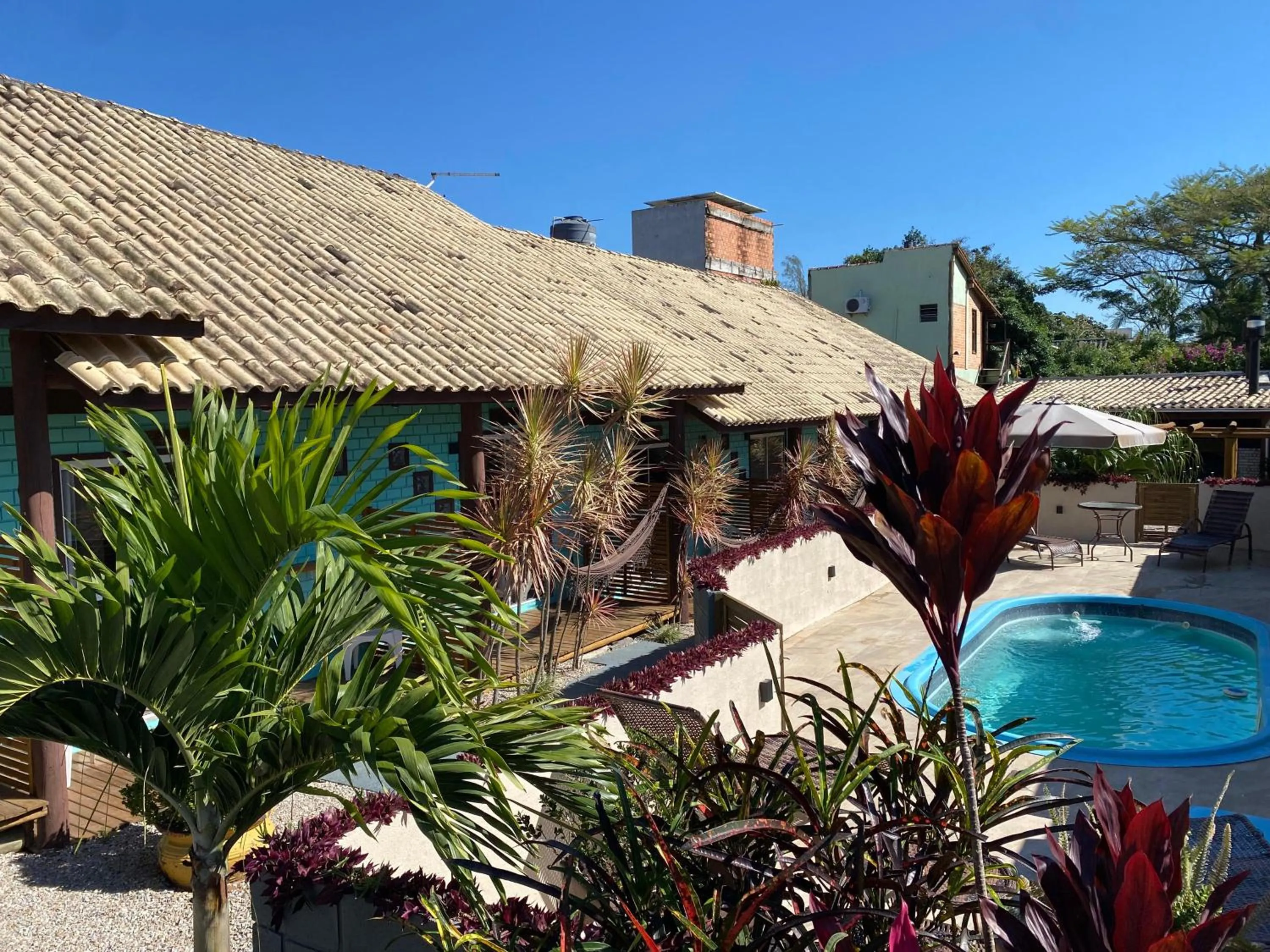 Swimming pool in Pousada Hanalie by - Easy Hotéis