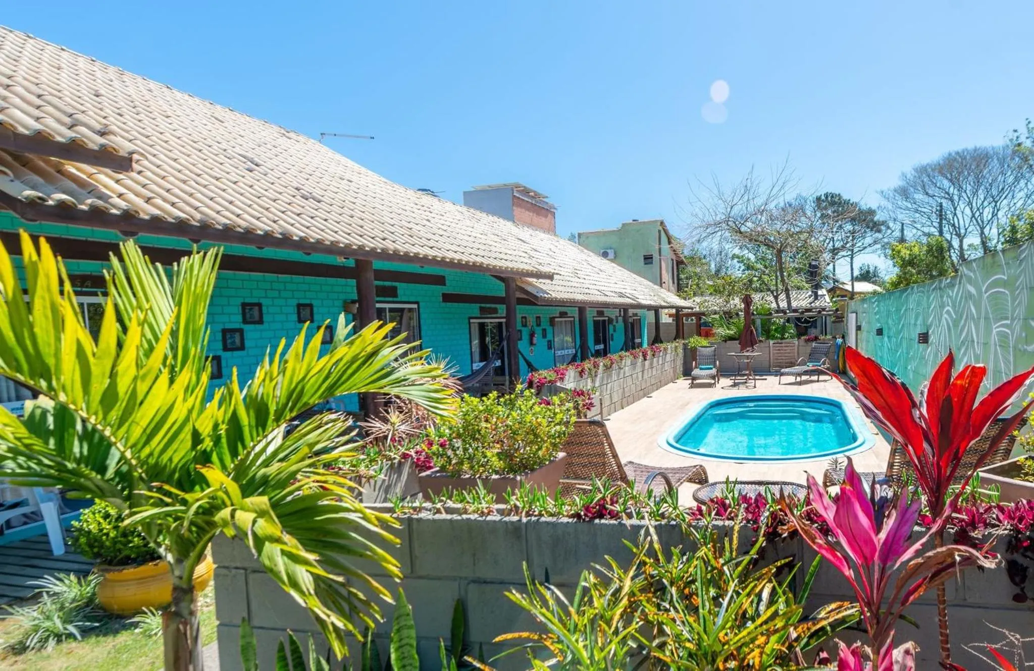 Swimming pool in Pousada Hanalie by - Easy Hotéis
