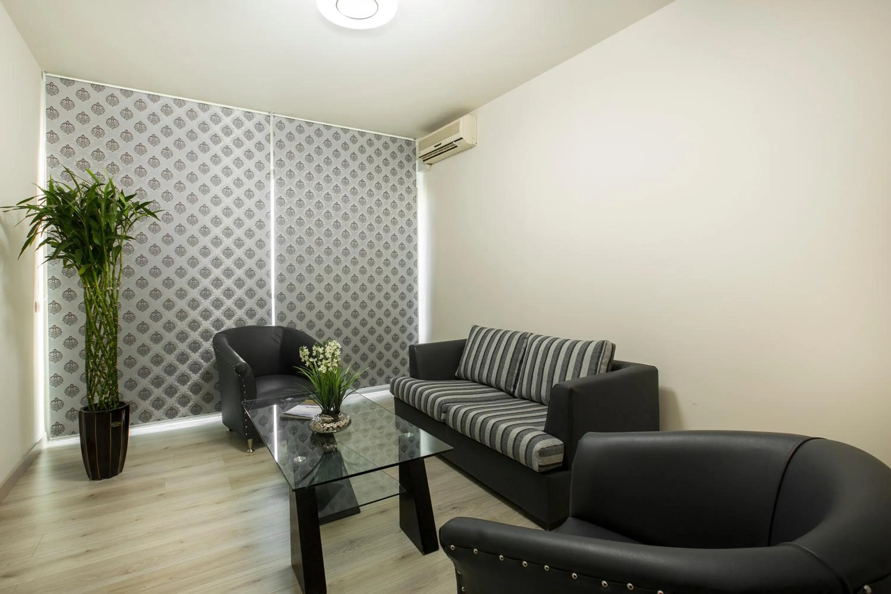 Living room in Orient Queen Homes Hotel