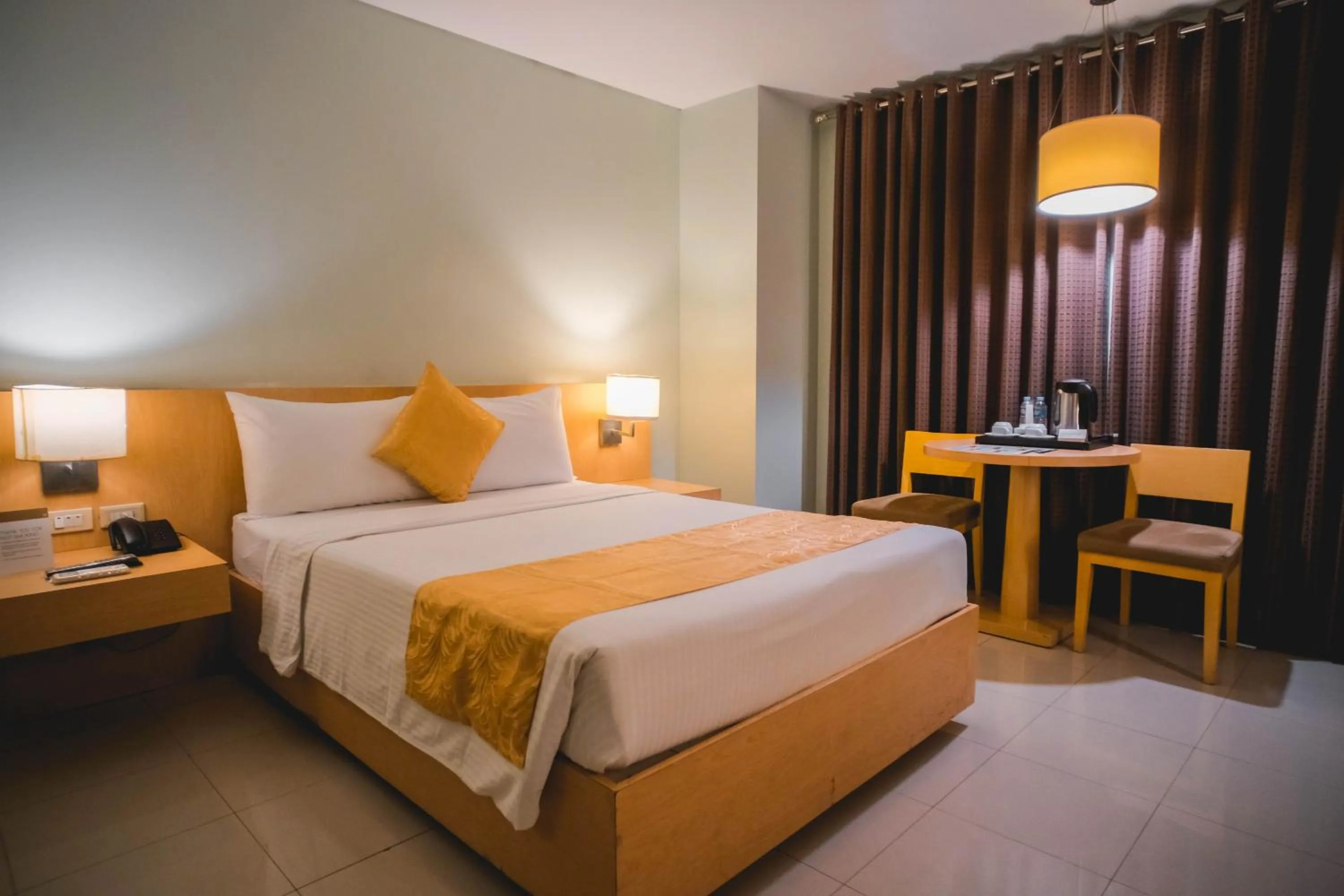 Bed in Manila Grand Opera Hotel