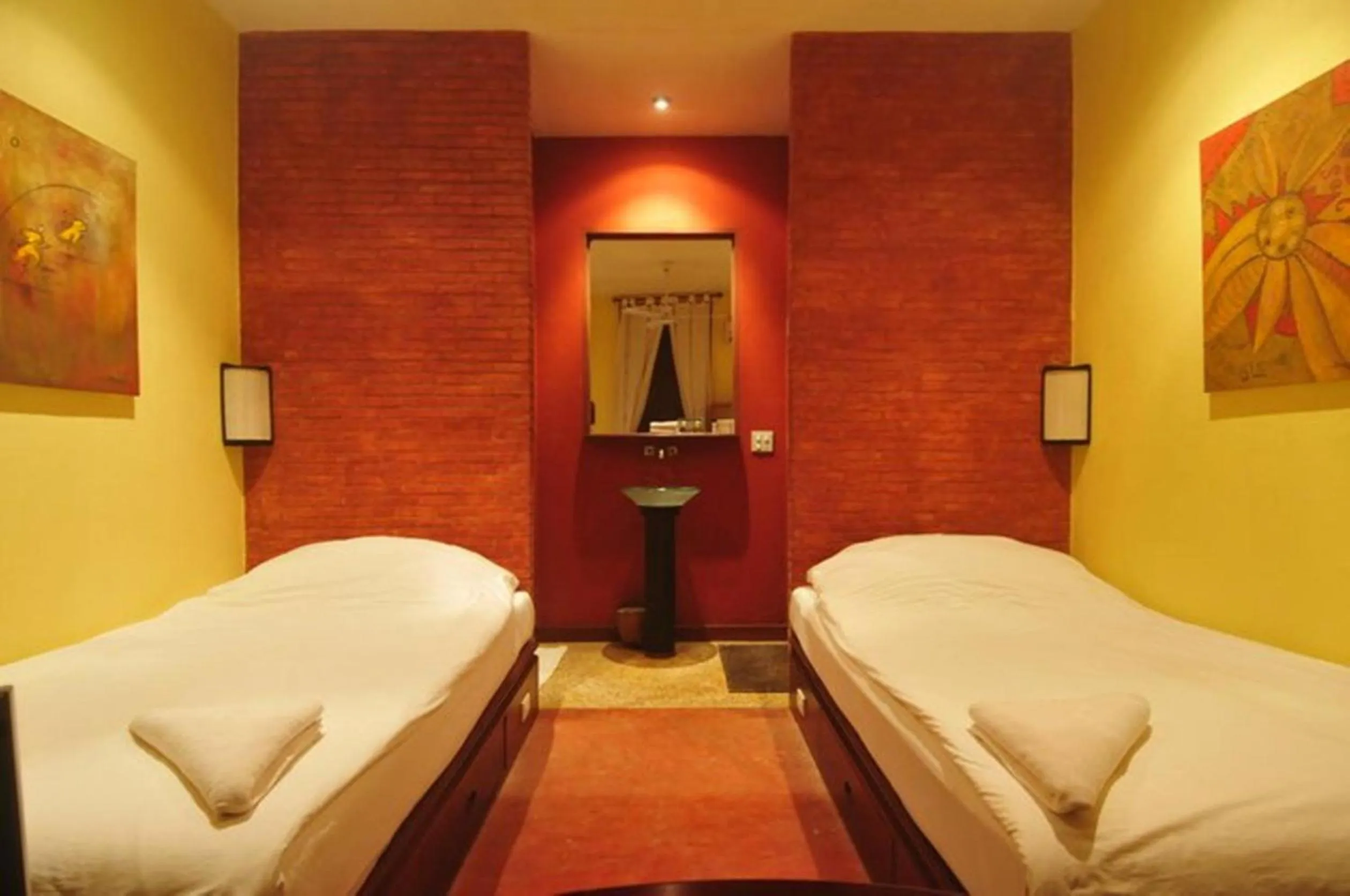 Photo of the whole room, Bed in Inthira Thakhek