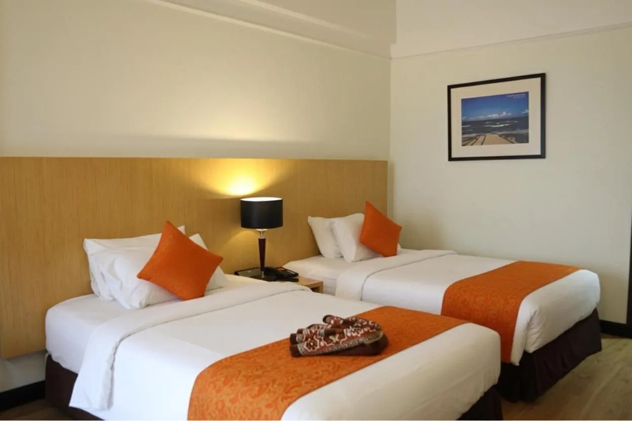 Bed in Primula Beach Hotel