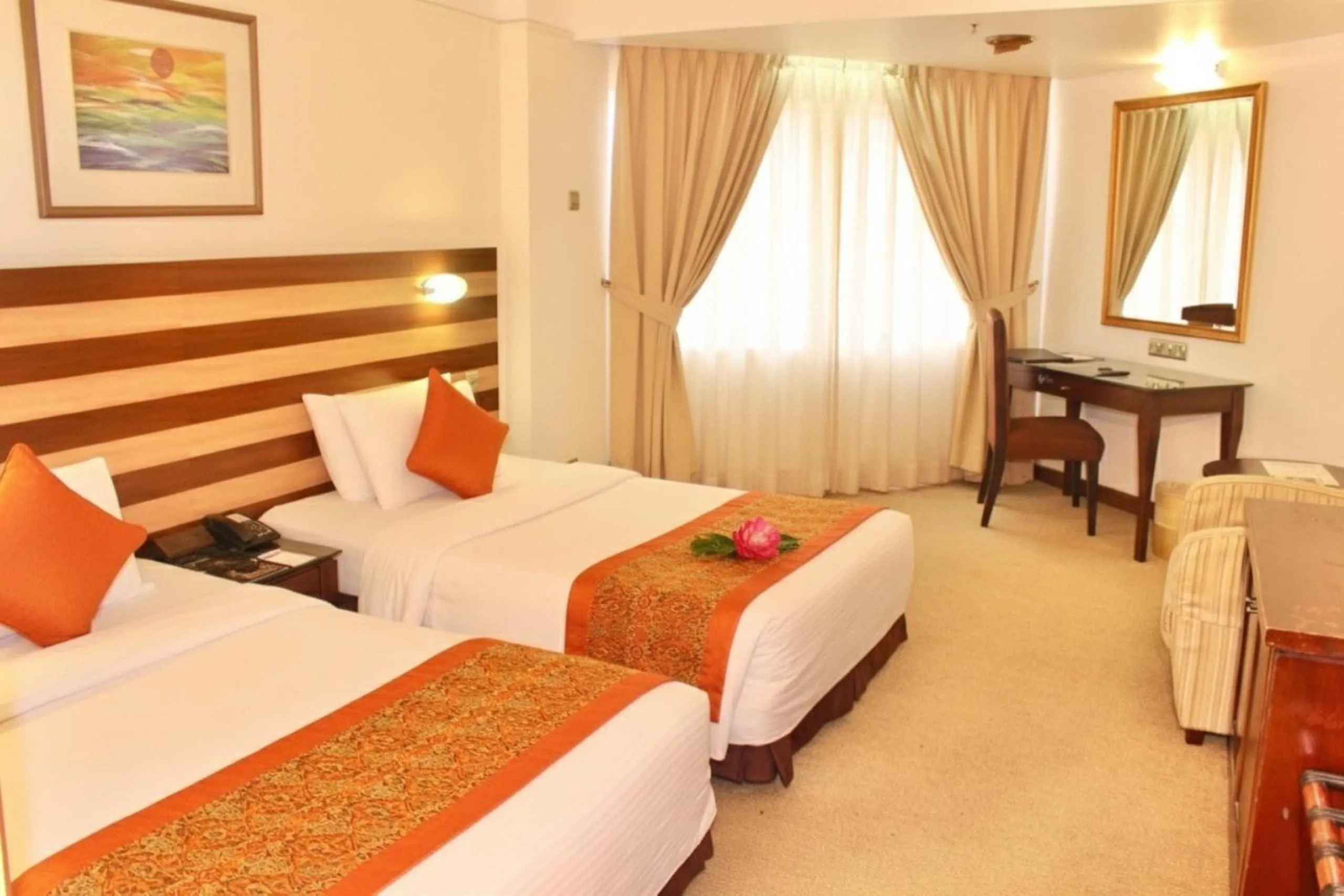 Bed in Primula Beach Hotel