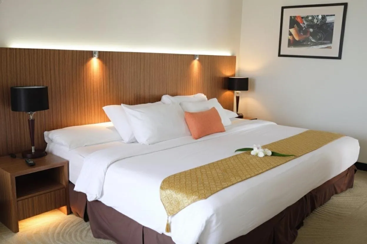 Bed in Primula Beach Hotel