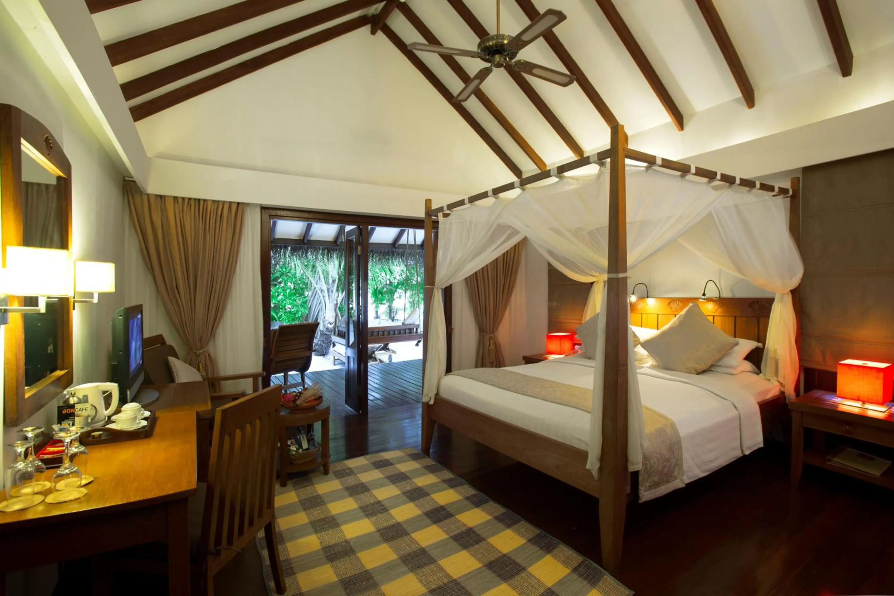Photo of the whole room, Bed in Medhufushi Island Resort