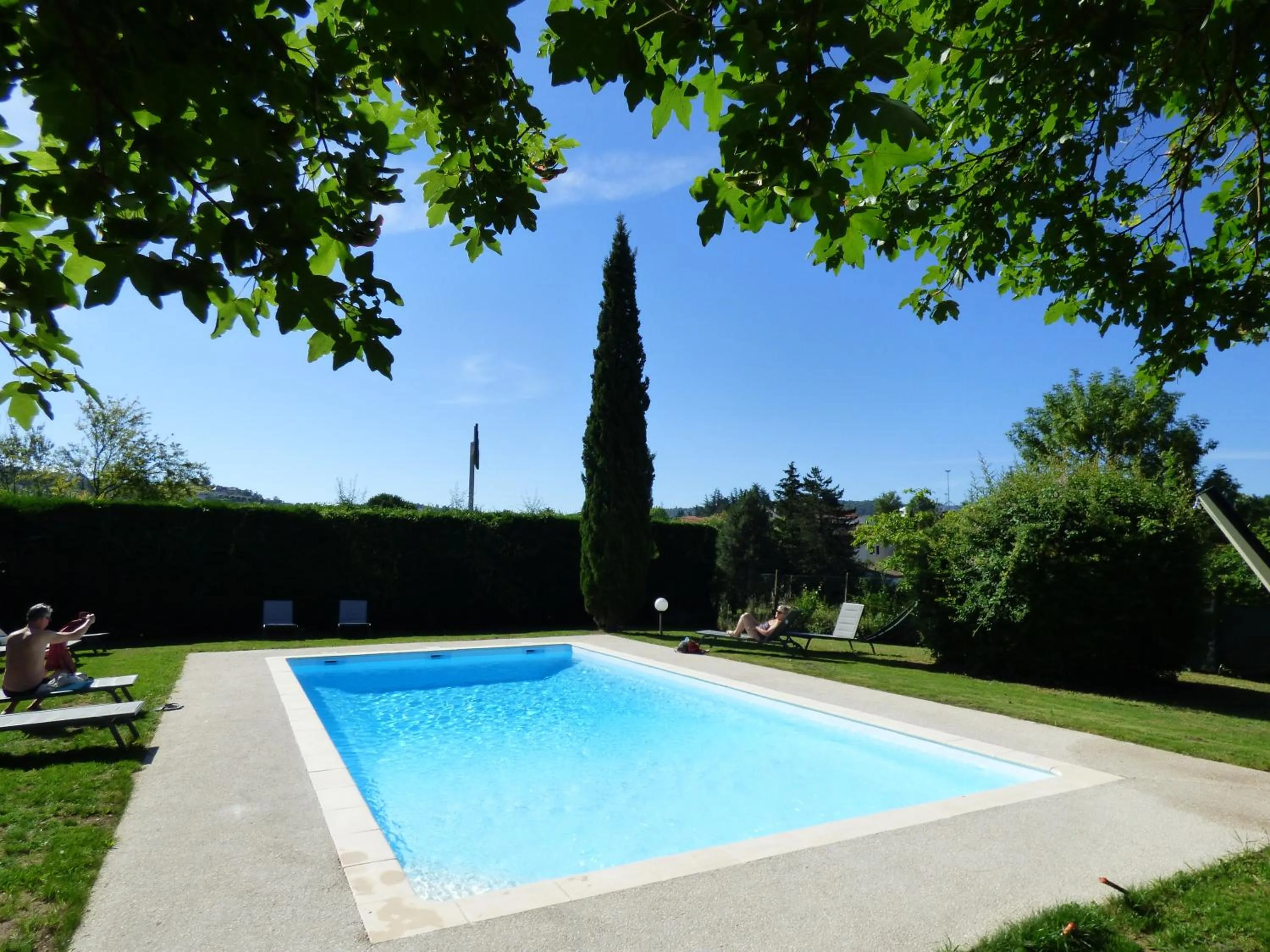 Swimming pool in inspiration by balladins Villefranche-de-Rouergue