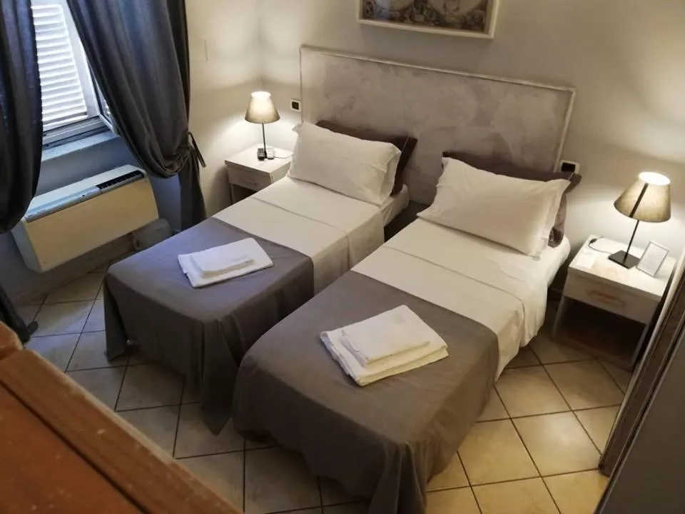 Bed in Guest House Relais Indipendenza