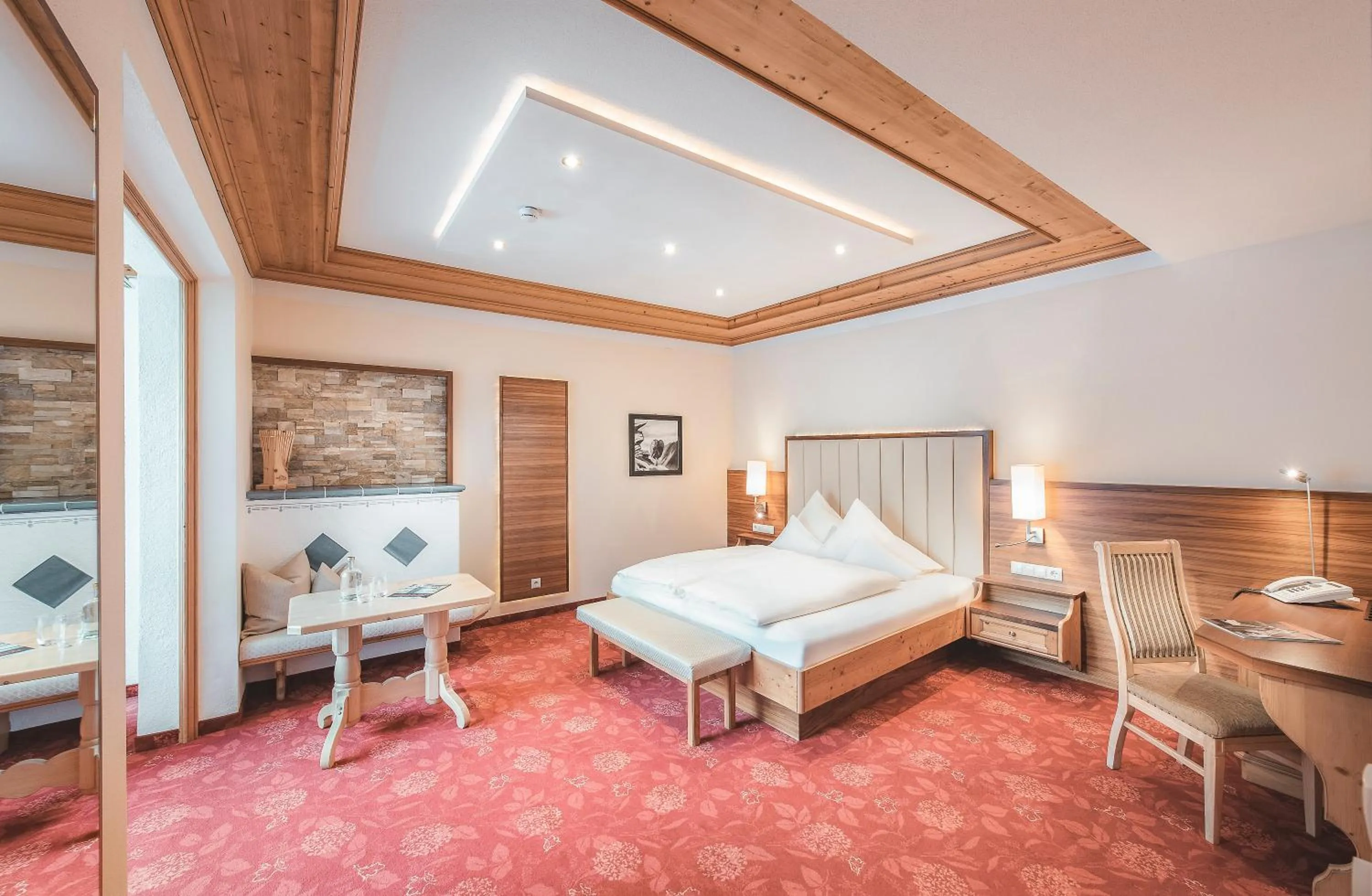 Photo of the whole room, Bed in Alpvita Piz Tasna