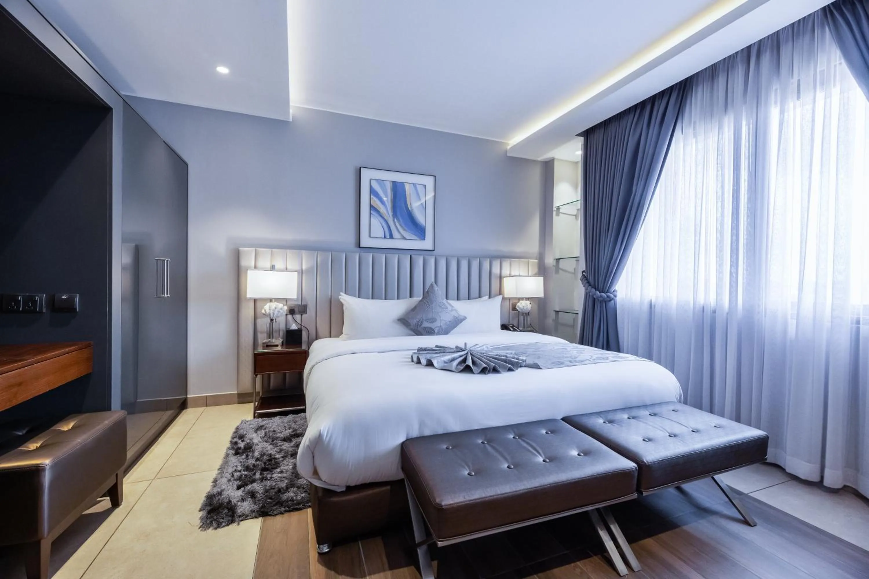 Bed in Oak Plaza Suites