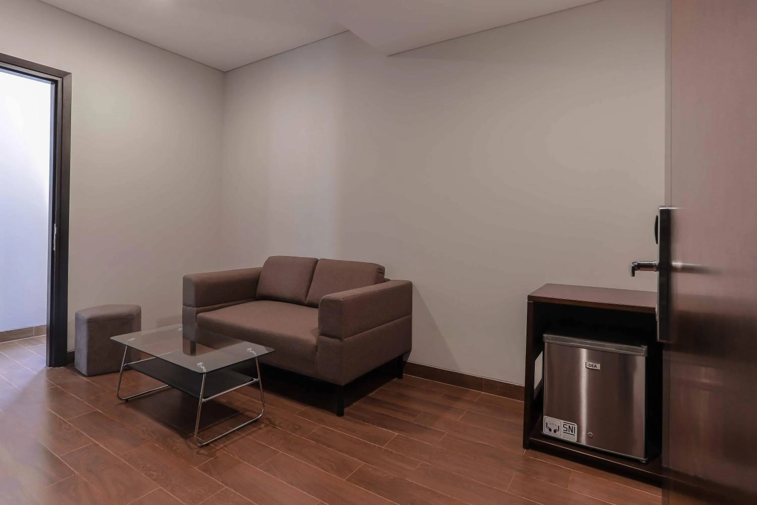 Seating area in PrimeBiz Hotel Surabaya