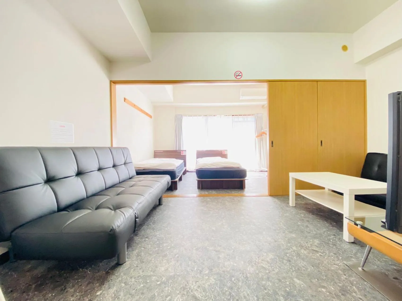 Bed in Grande Famille Shimanouchi Dotonbori Condo