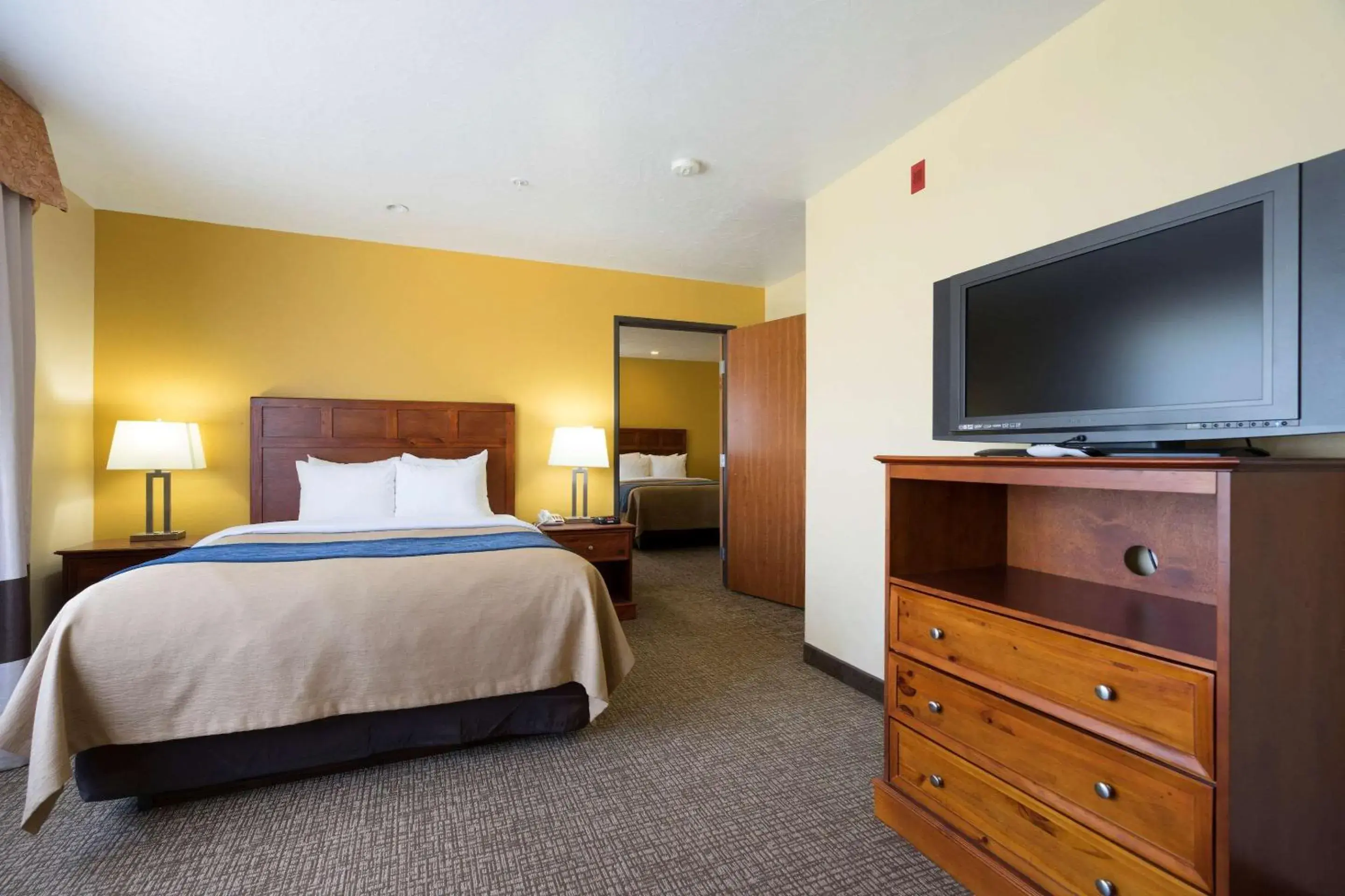 Queen Suite with Three Queen Beds in Comfort Inn & Suites Queen Suite with Three Queen Beds in Comfort Inn & Suites