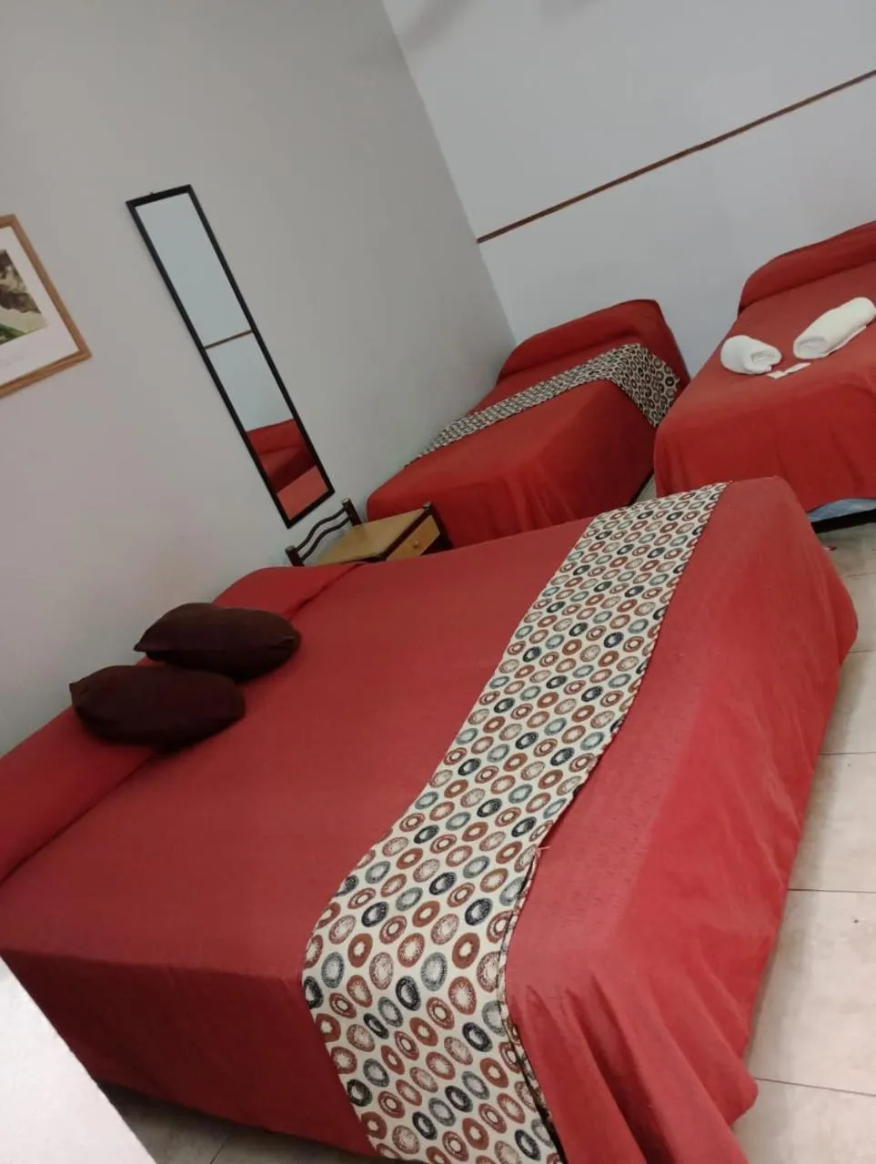 Bed in San Remo Resort Hotel