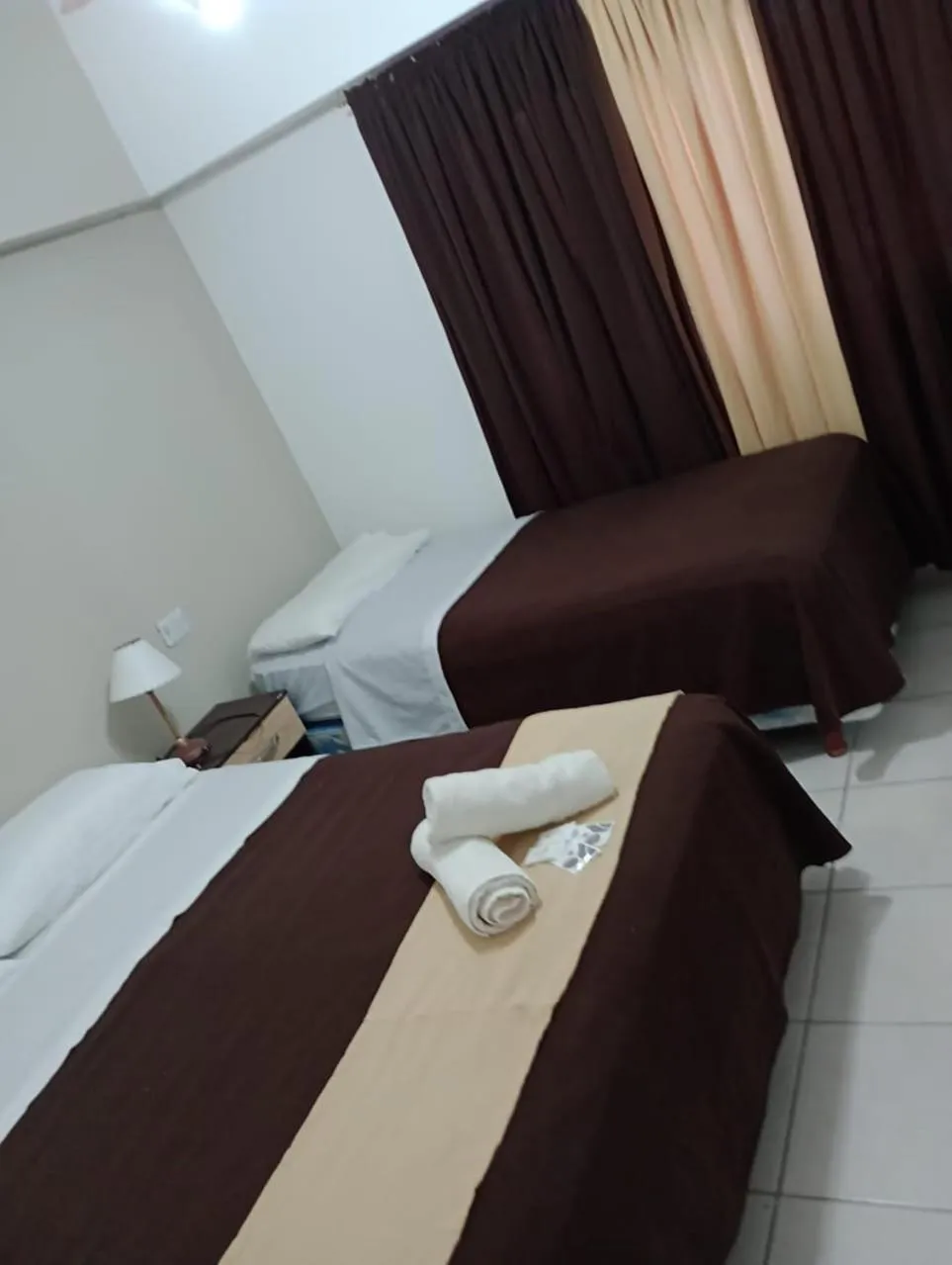 Bed in San Remo Resort Hotel