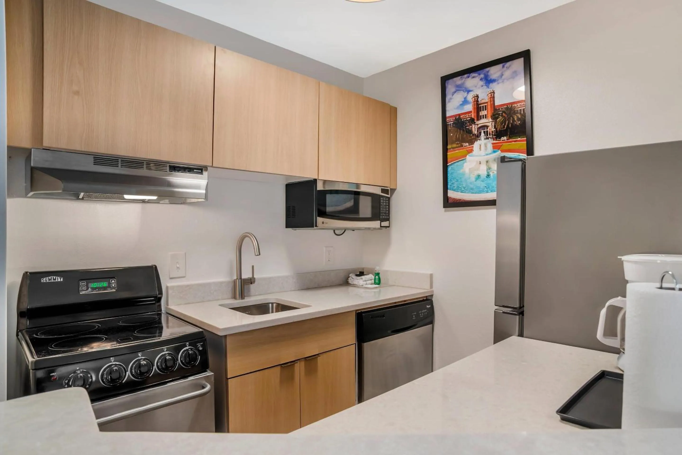 Bedroom in Alluxsuites at 1876, an Ascend Collection Hotel