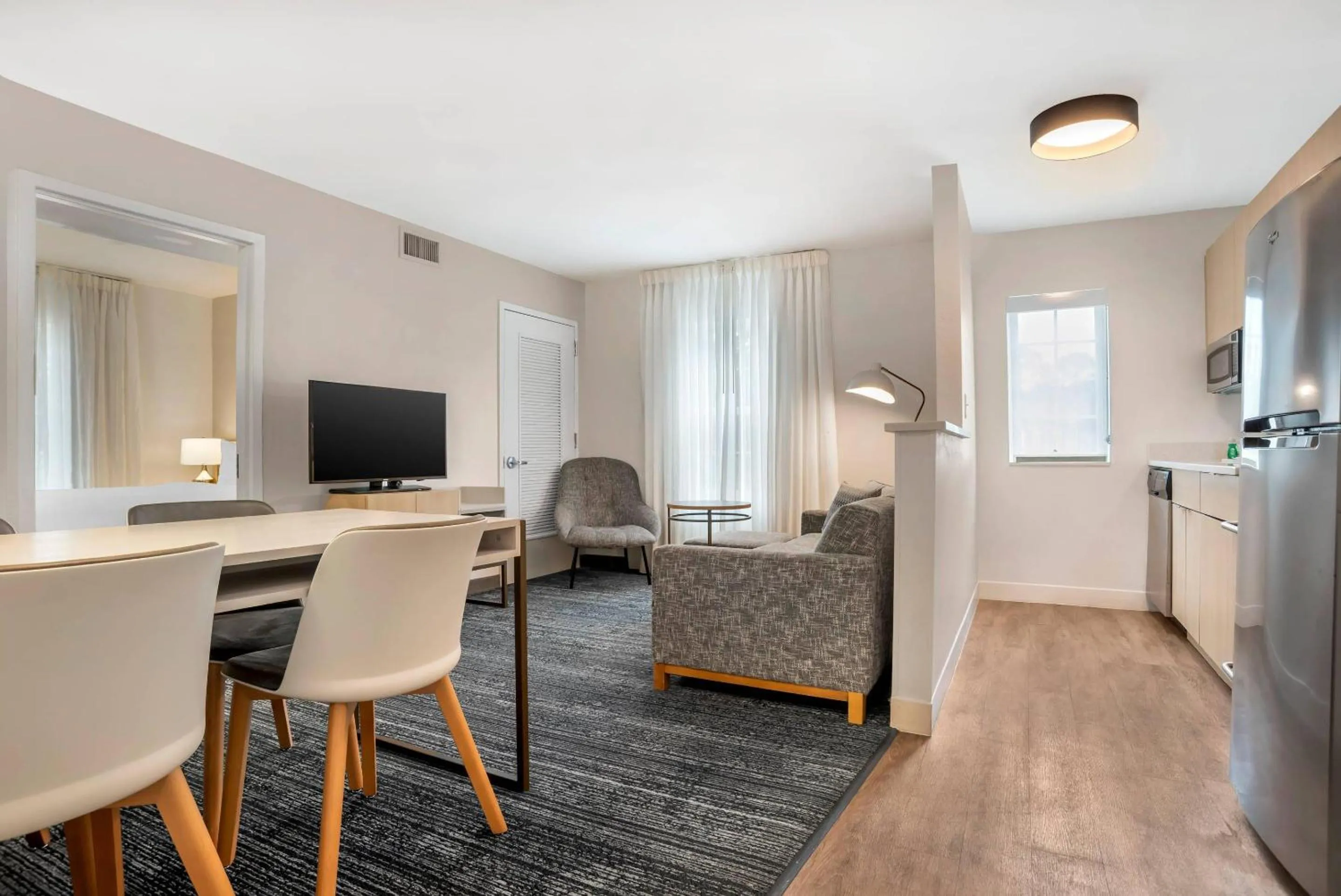 Bedroom in Alluxsuites at 1876, an Ascend Collection Hotel
