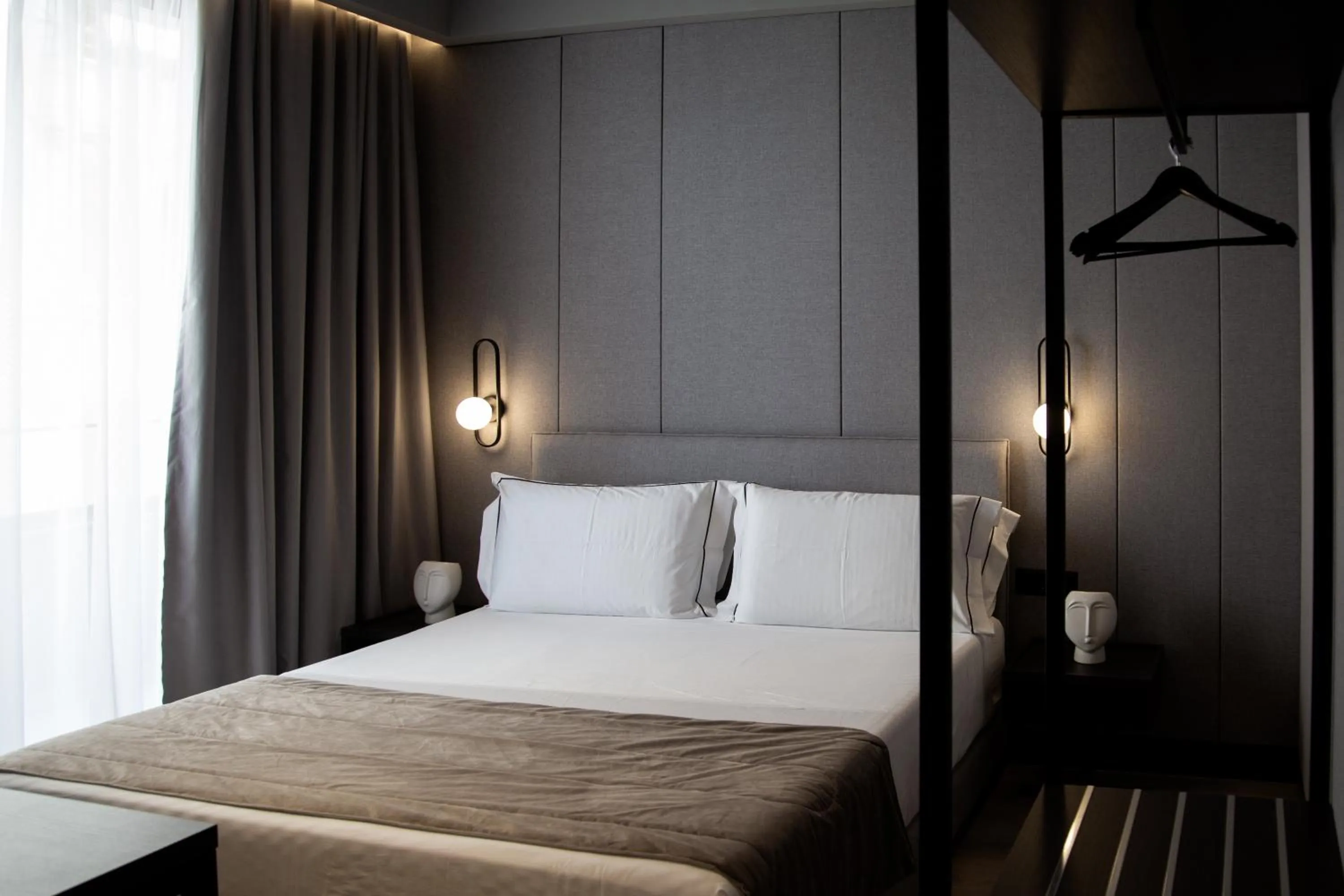 Bed in Miramare Boutique Hotel