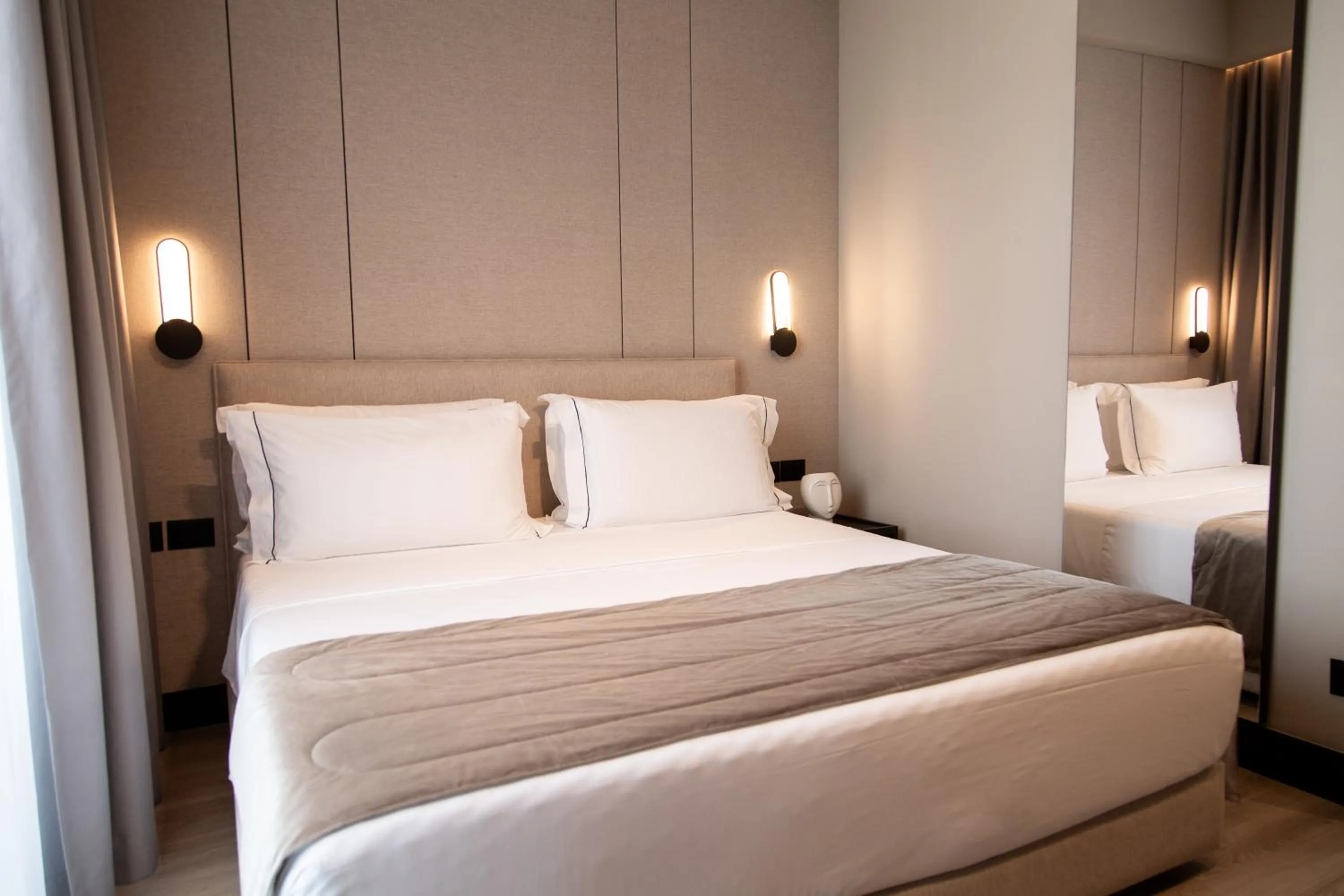 Bed in Miramare Boutique Hotel