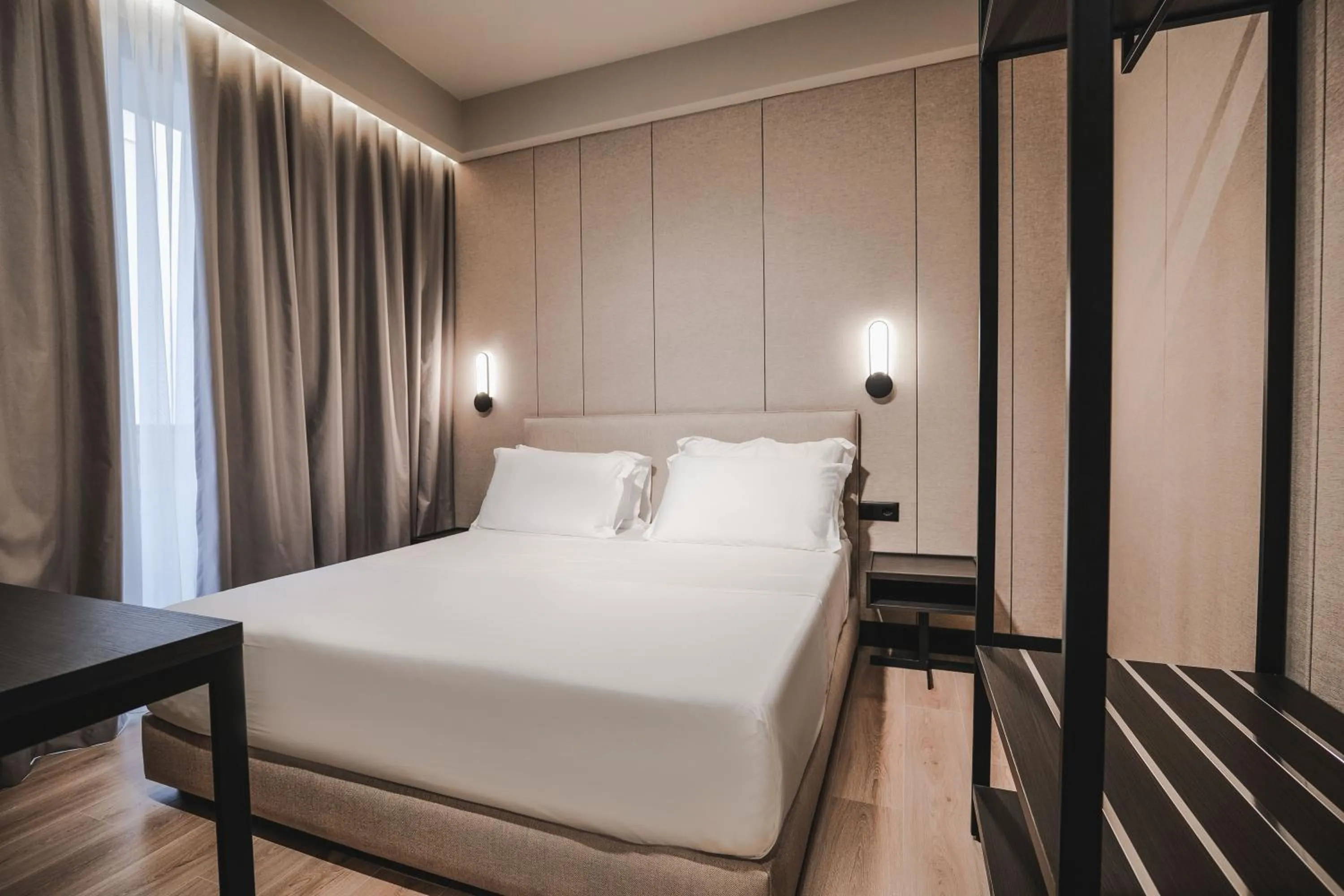 Bed in Miramare Boutique Hotel