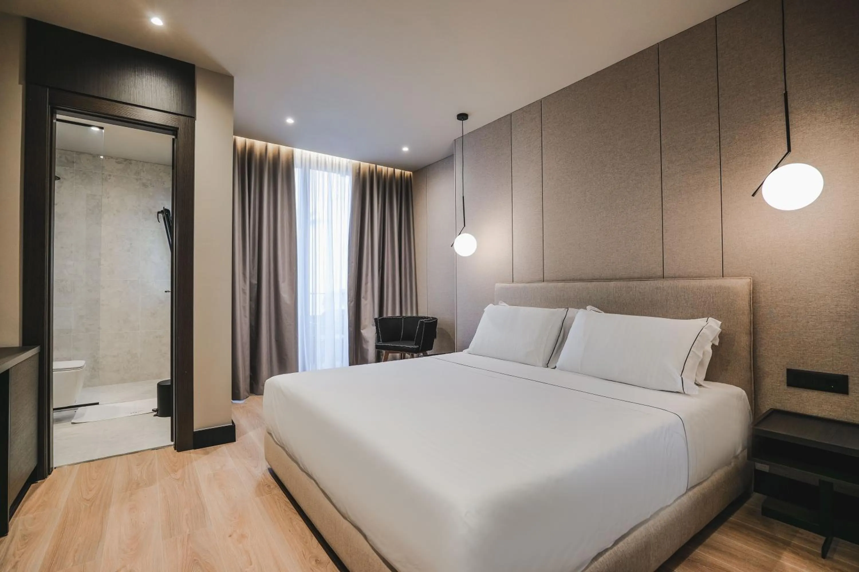 Bed in Miramare Boutique Hotel